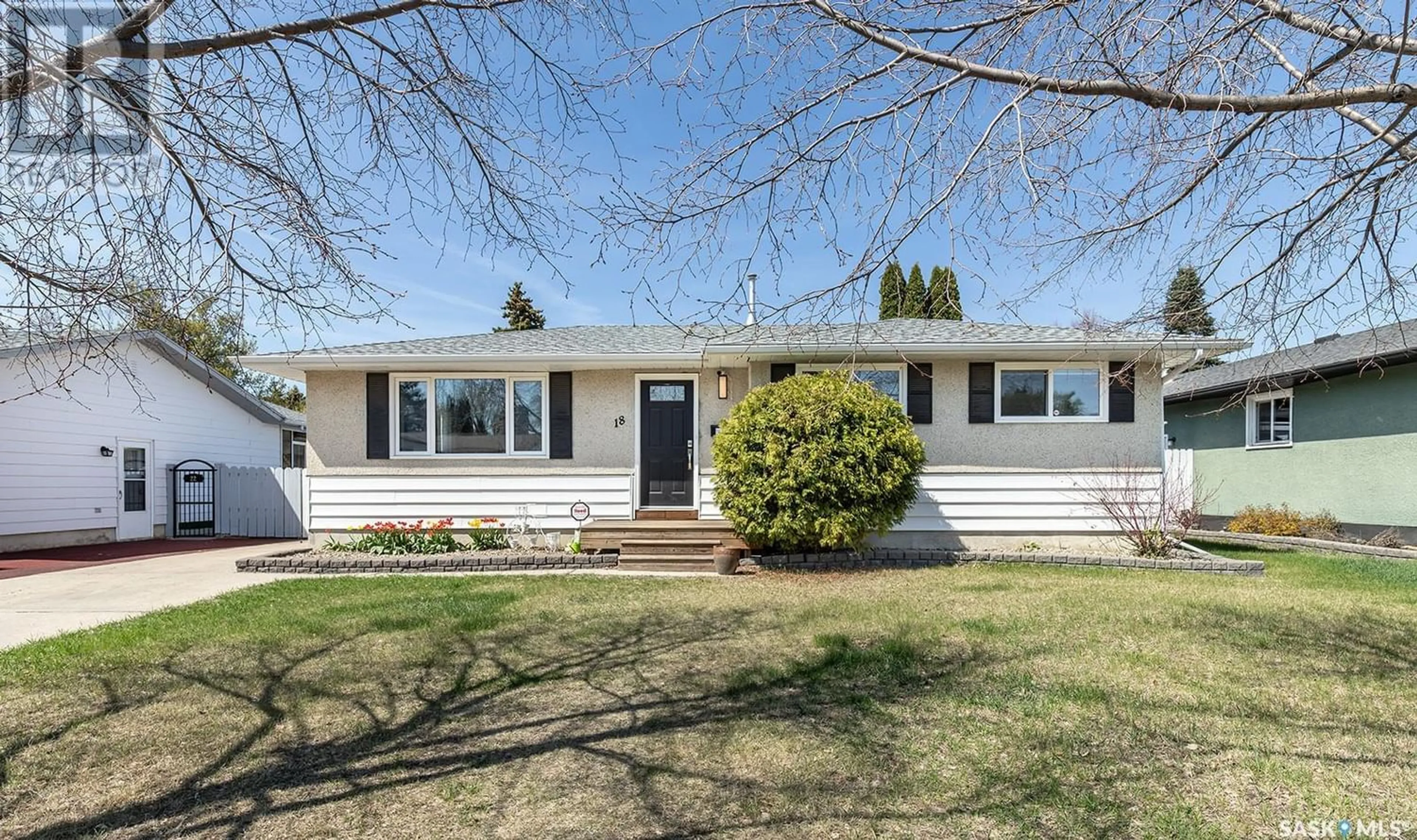 Home with vinyl exterior material for 18 Dumont CRESCENT, Saskatoon Saskatchewan S7J2X1