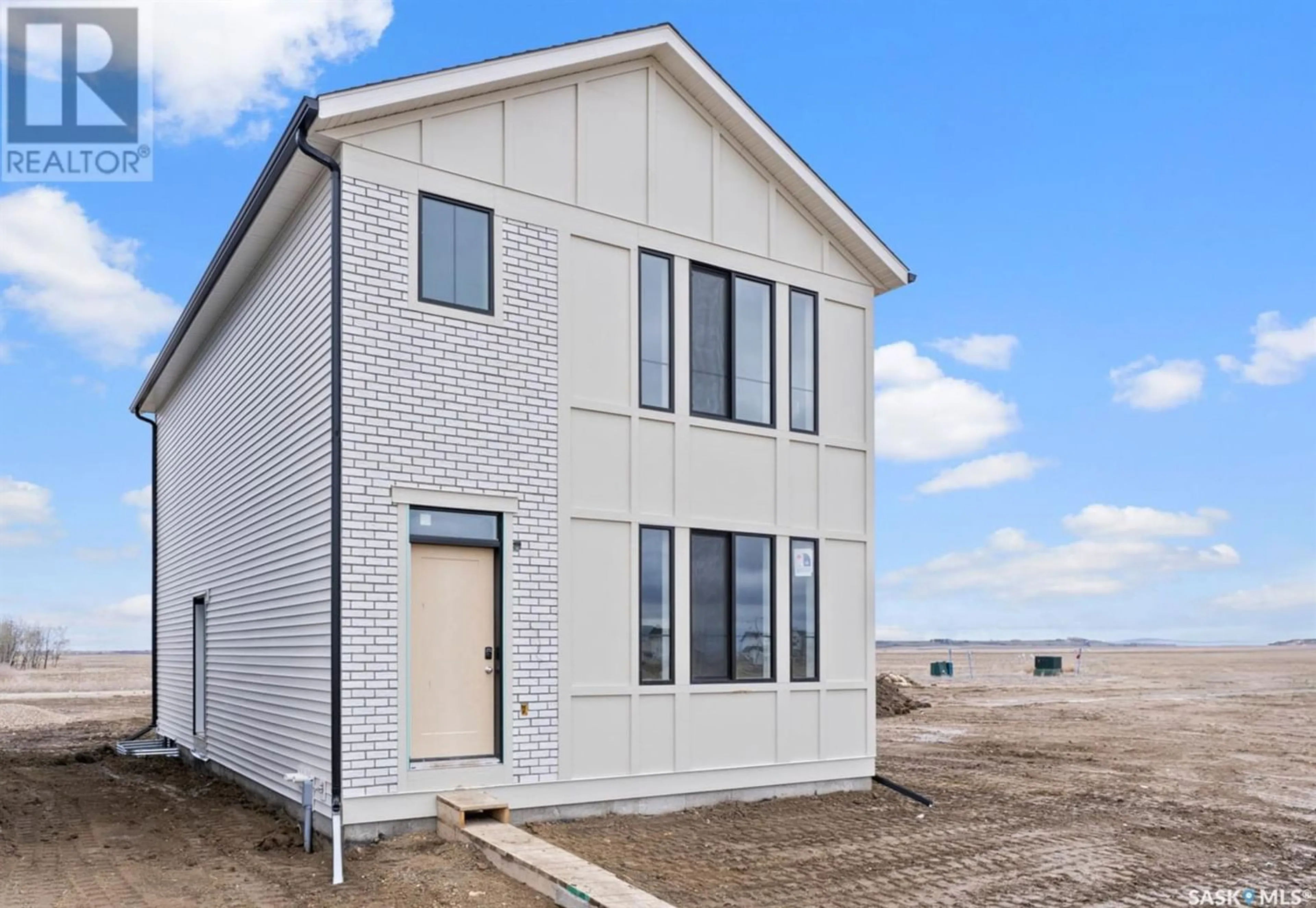 Home with brick exterior material for 743 Henry Dayday ROAD, Saskatoon Saskatchewan S7W1H5