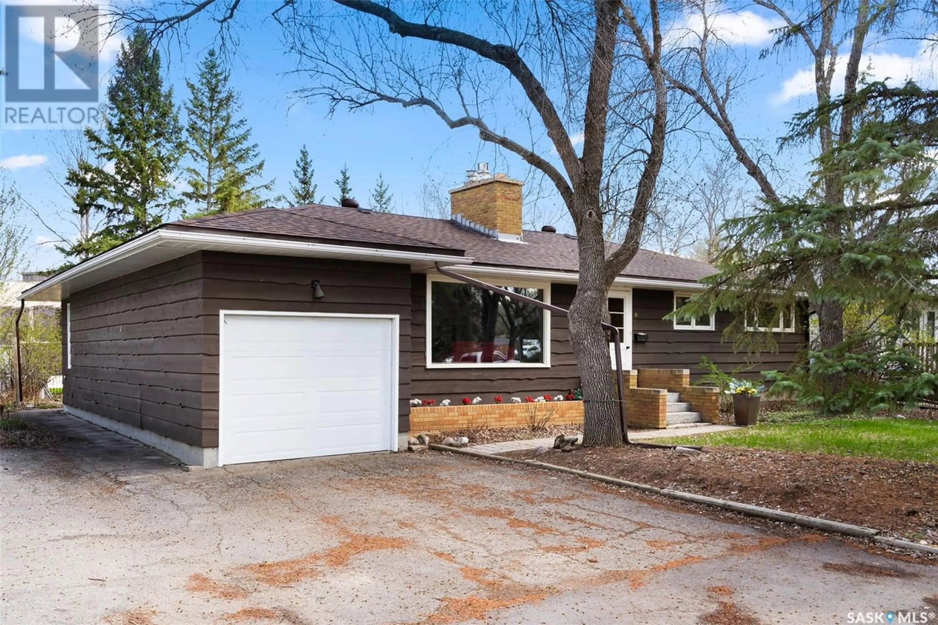 Home with brick exterior material for 6 Langley STREET, Regina Saskatchewan S4S3V6