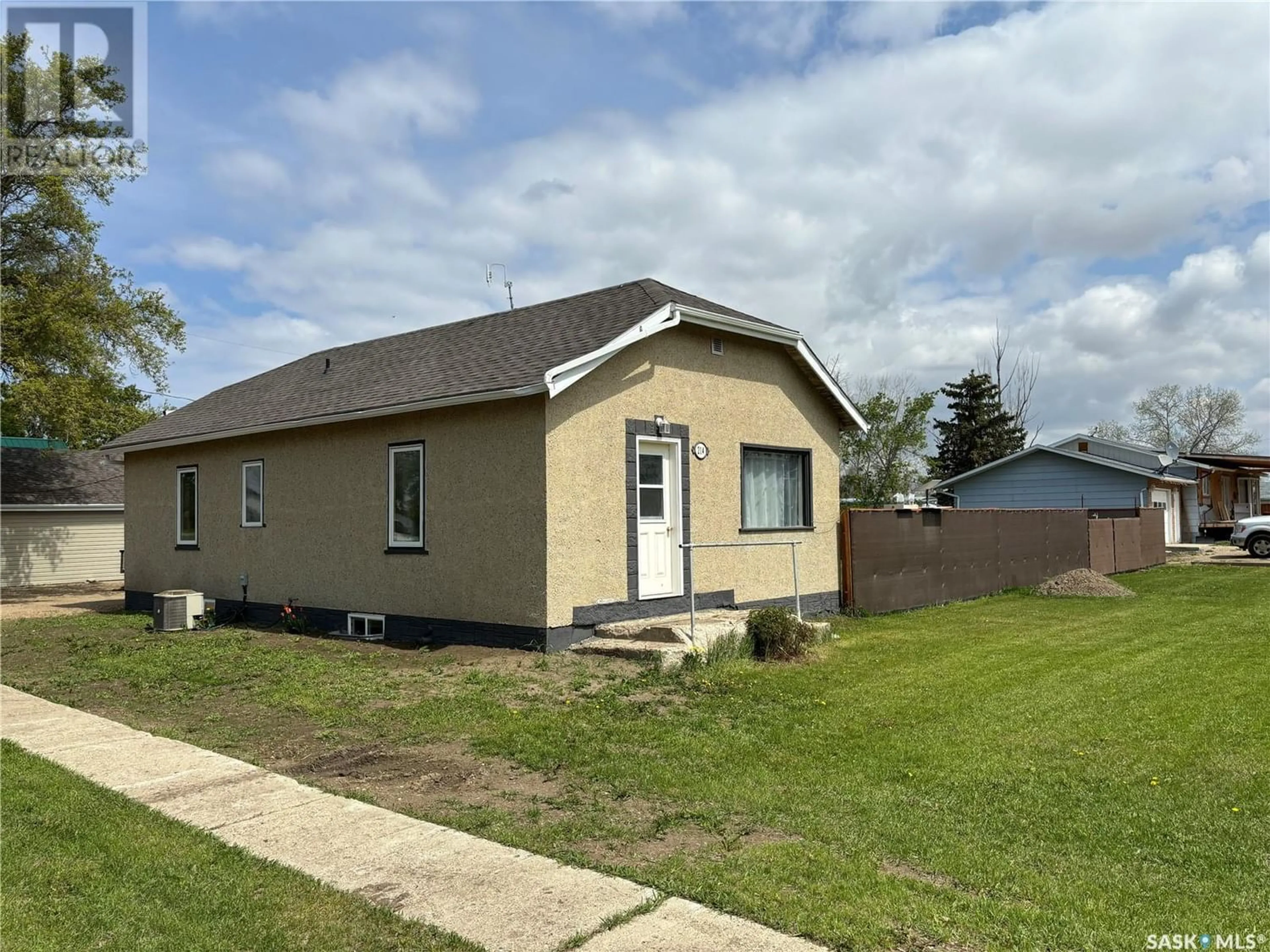 Frontside or backside of a home for 214 2nd AVENUE, Wiseton Saskatchewan S0L3M0