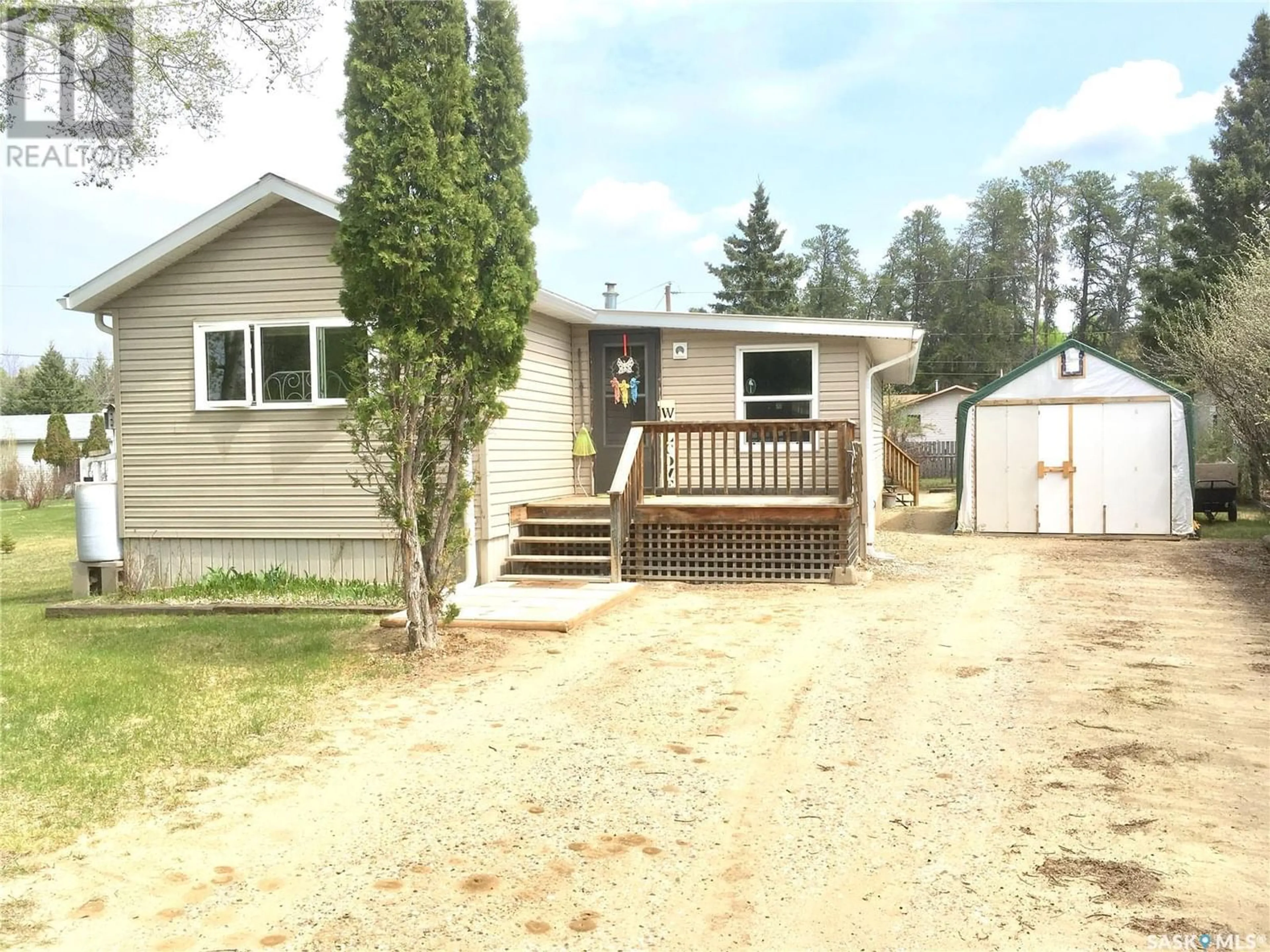 Frontside or backside of a home for 7 3rd STREET, Holbein Saskatchewan S0J1G0