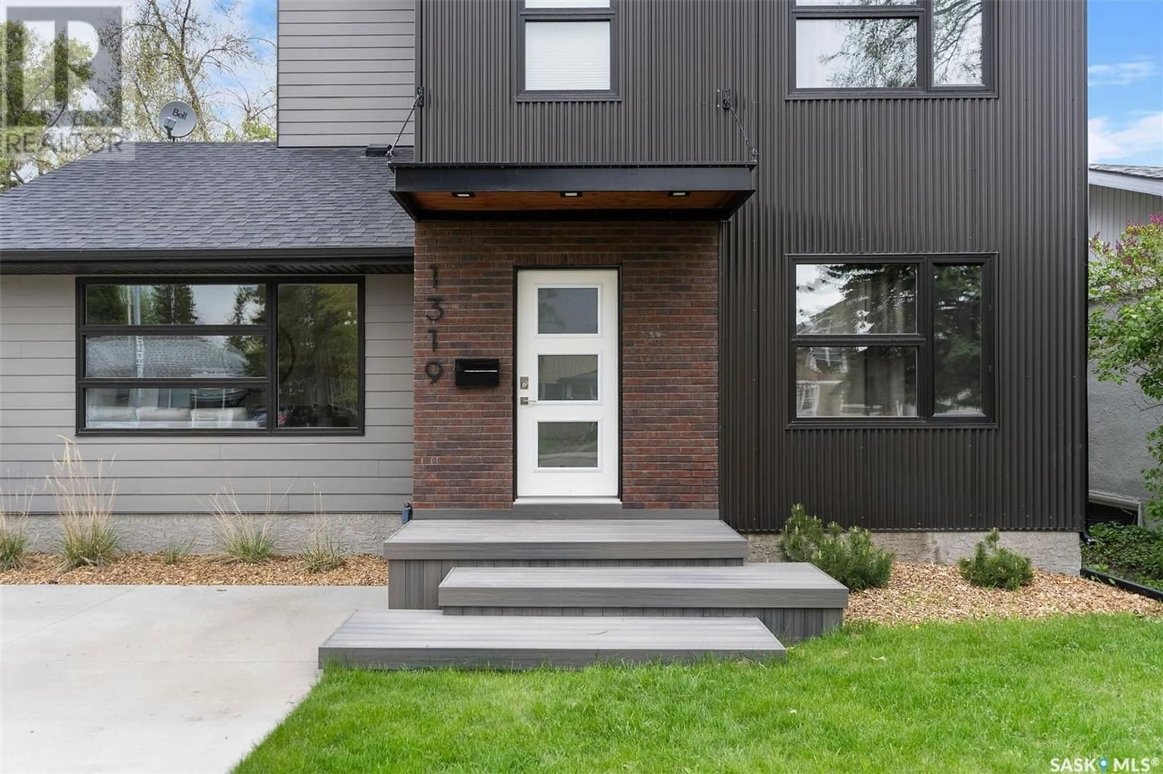 Home with brick exterior material for 1319 13th STREET E, Saskatoon Saskatchewan S7H0C5