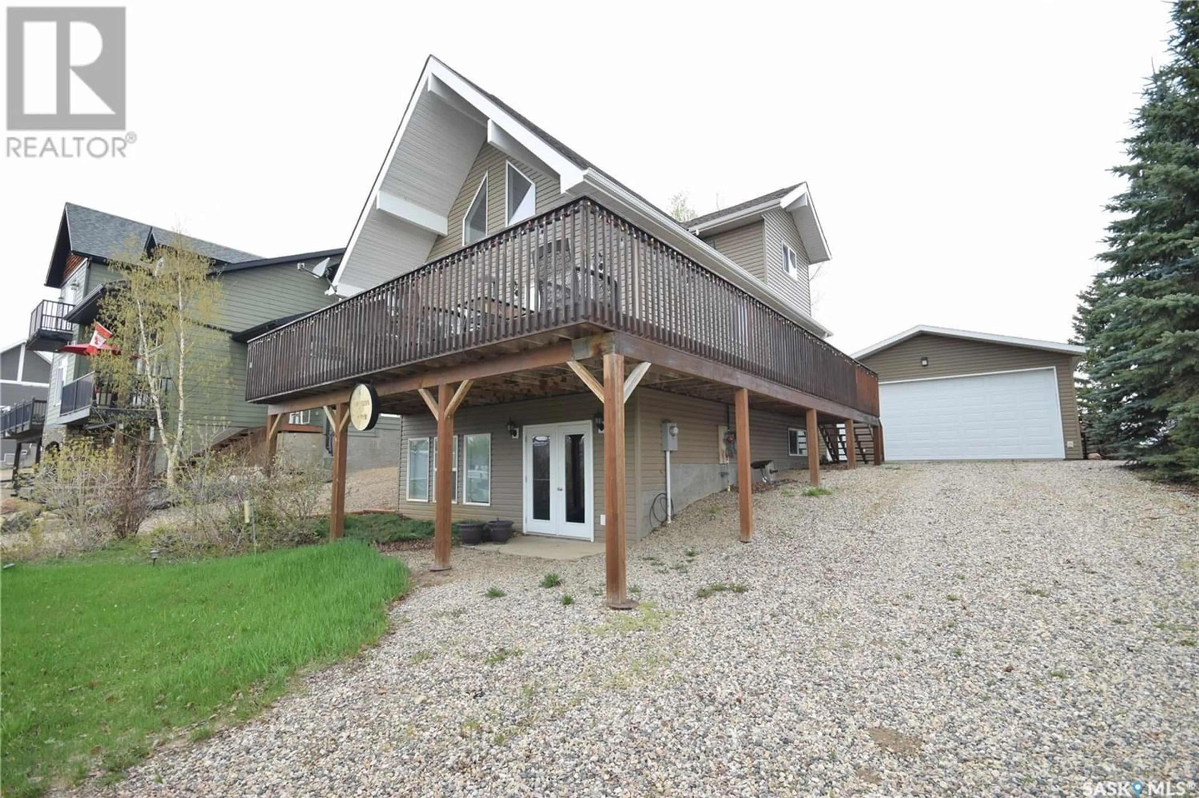 A pic from exterior of the house or condo for 104 Sunridge ROAD, Pebble Baye Saskatchewan S0J2G0