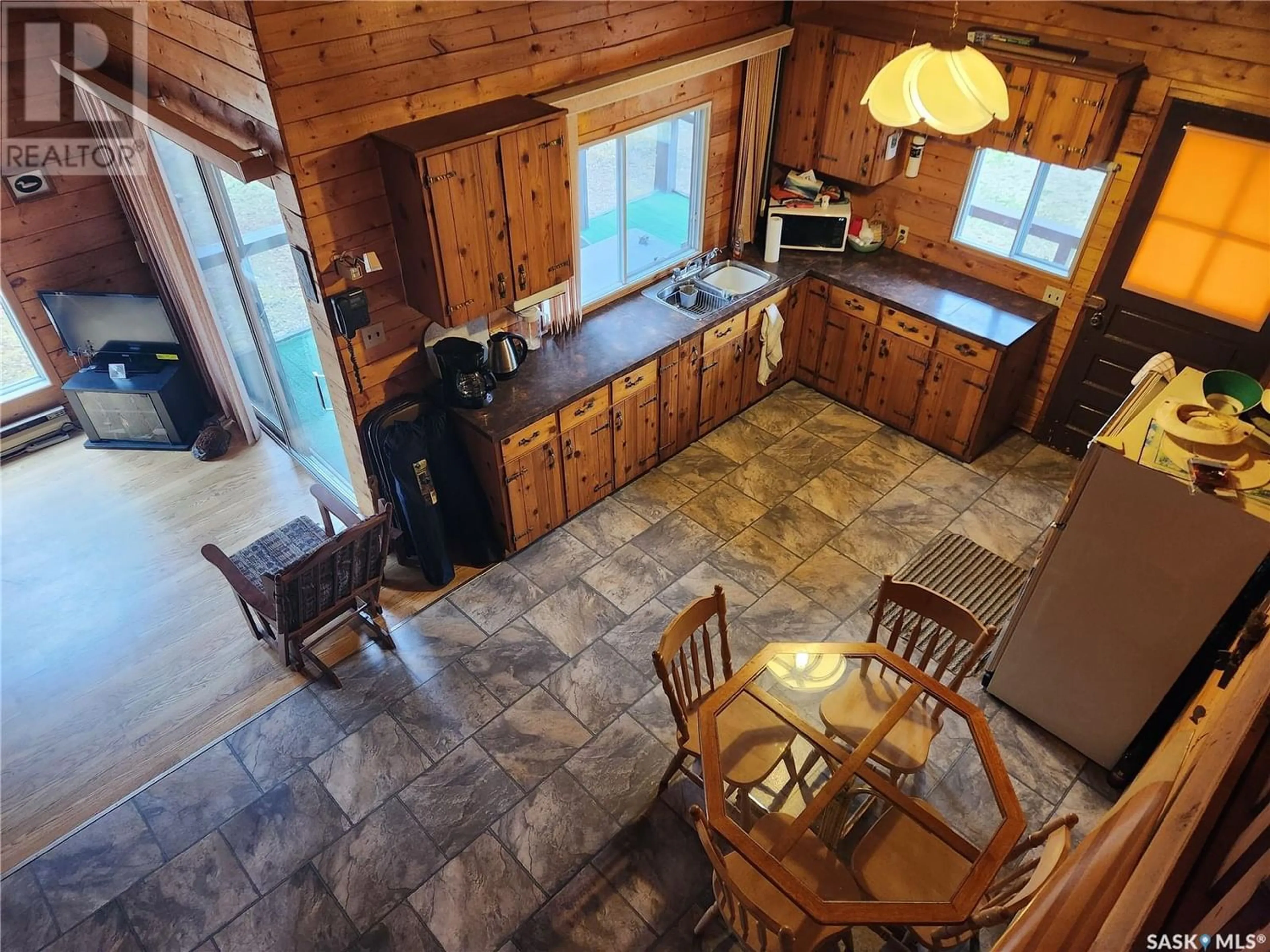 Open concept kitchen, ceramic/tile floor for #5 Lookout ROAD, Jan Lake Saskatchewan S0P0A0