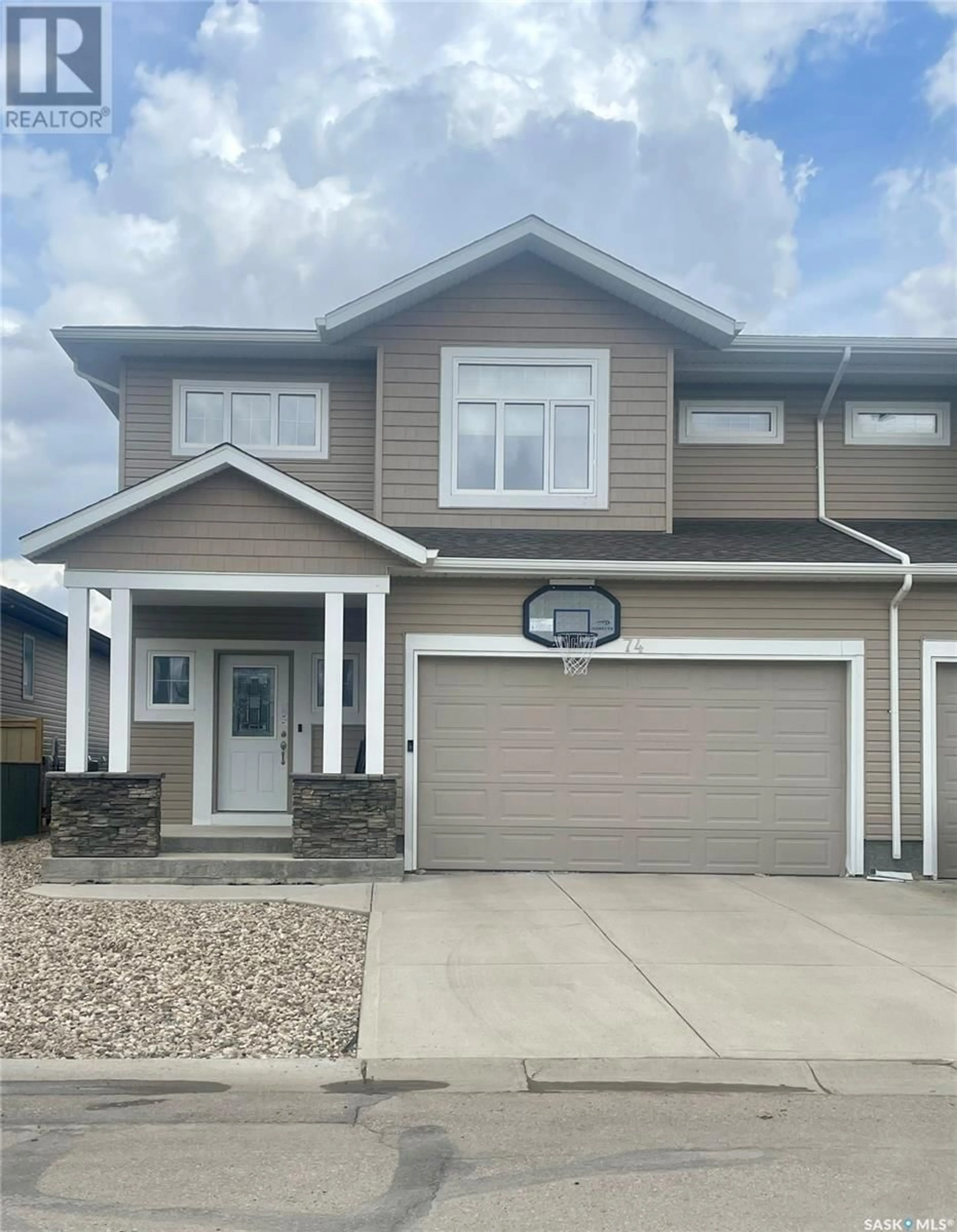 Home with vinyl exterior material for 74 Good Spirit CRESCENT, Yorkton Saskatchewan S3N0M6