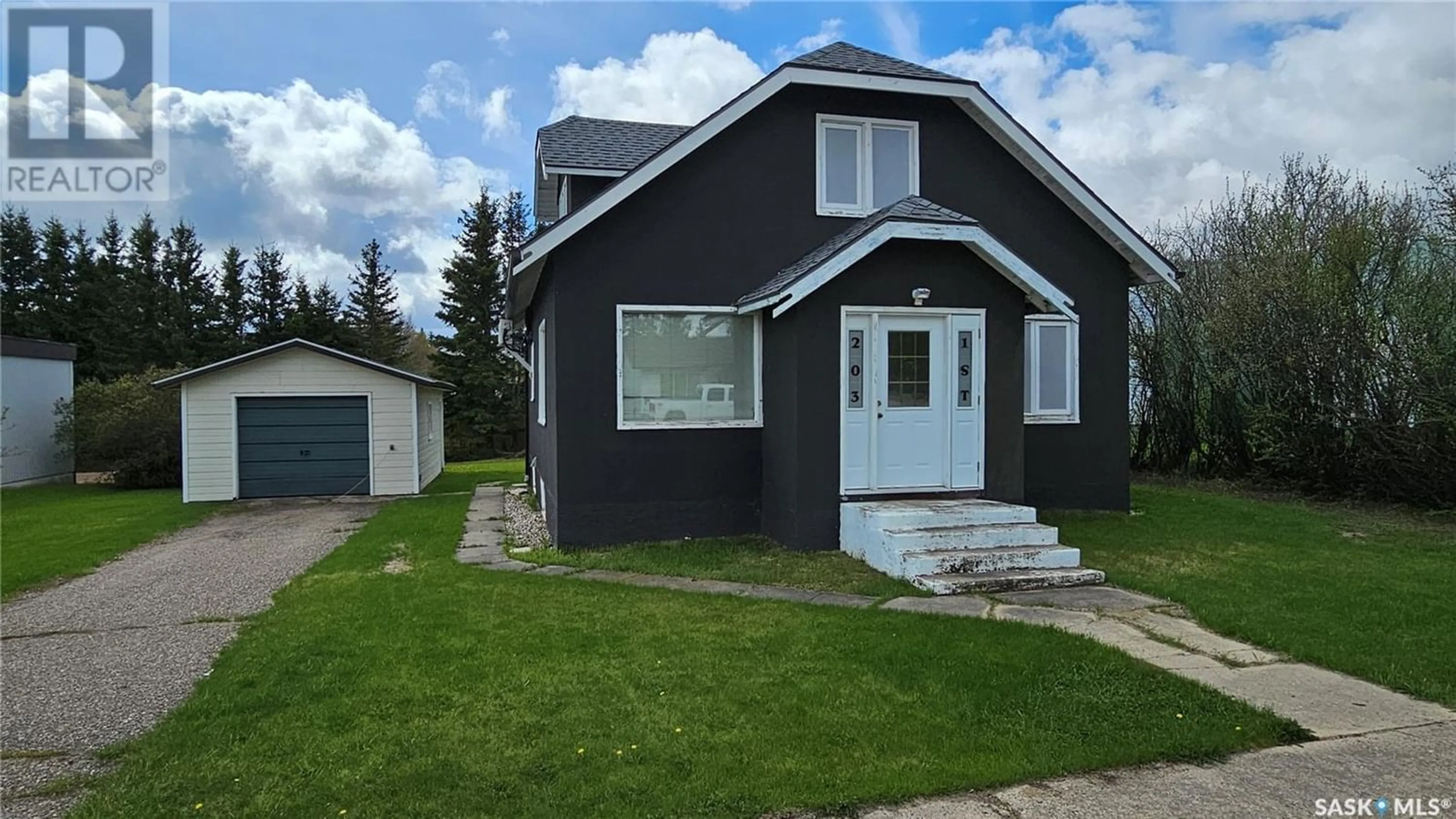 Frontside or backside of a home for 203 1st STREET S, Middle Lake Saskatchewan S0K2X0