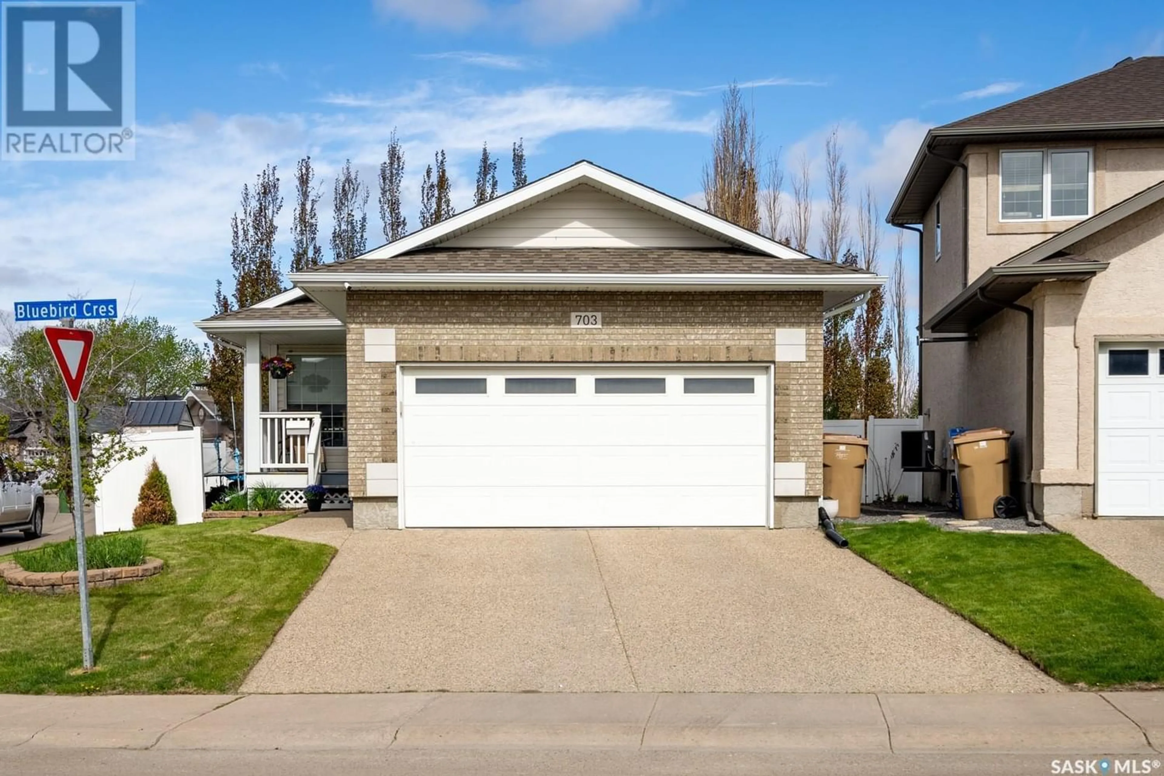 Frontside or backside of a home for 703 Bluebird CRESCENT, Regina Saskatchewan S4N7S3