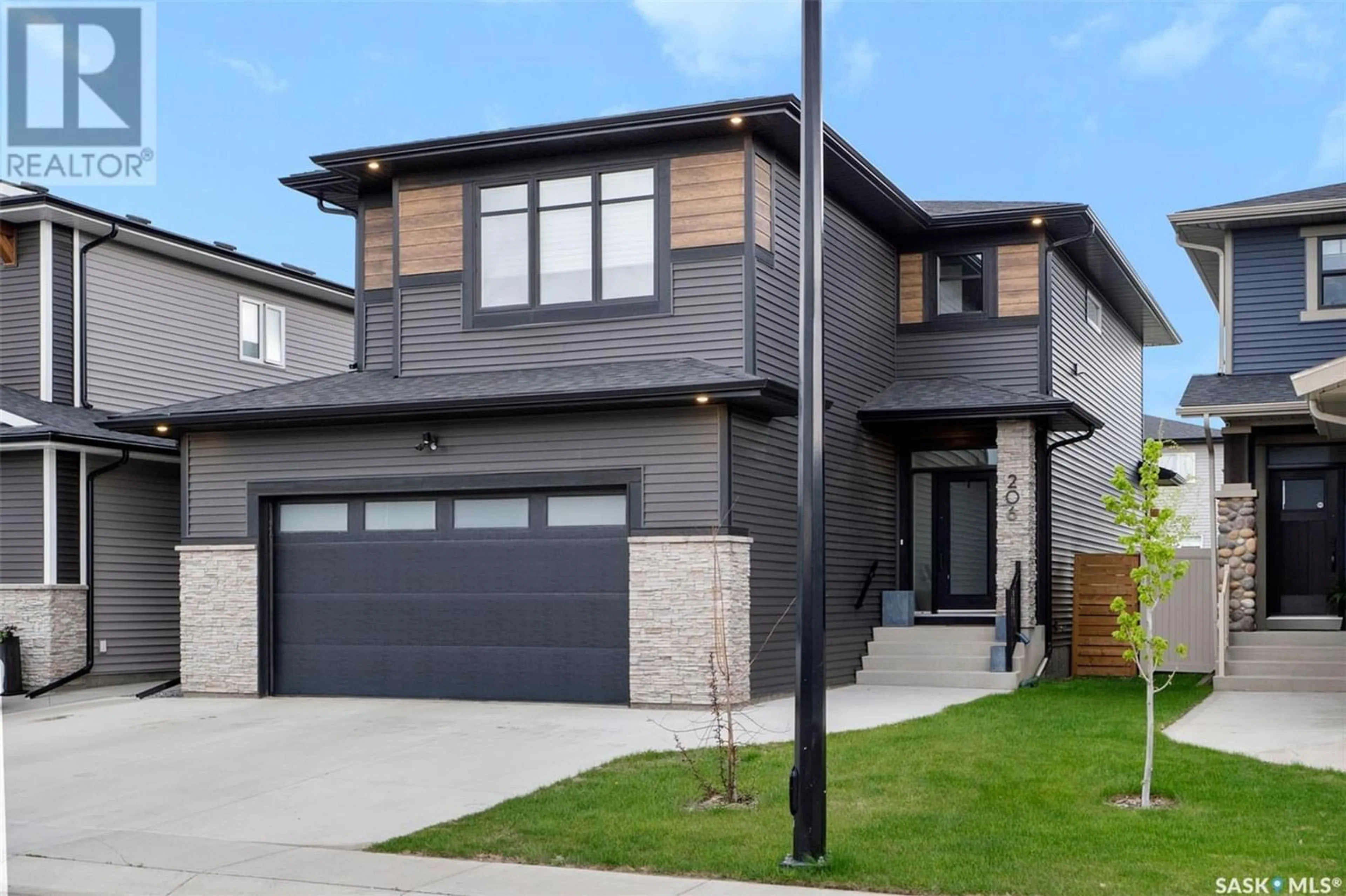 Frontside or backside of a home for 206 Germain COURT, Saskatoon Saskatchewan S7V0T7