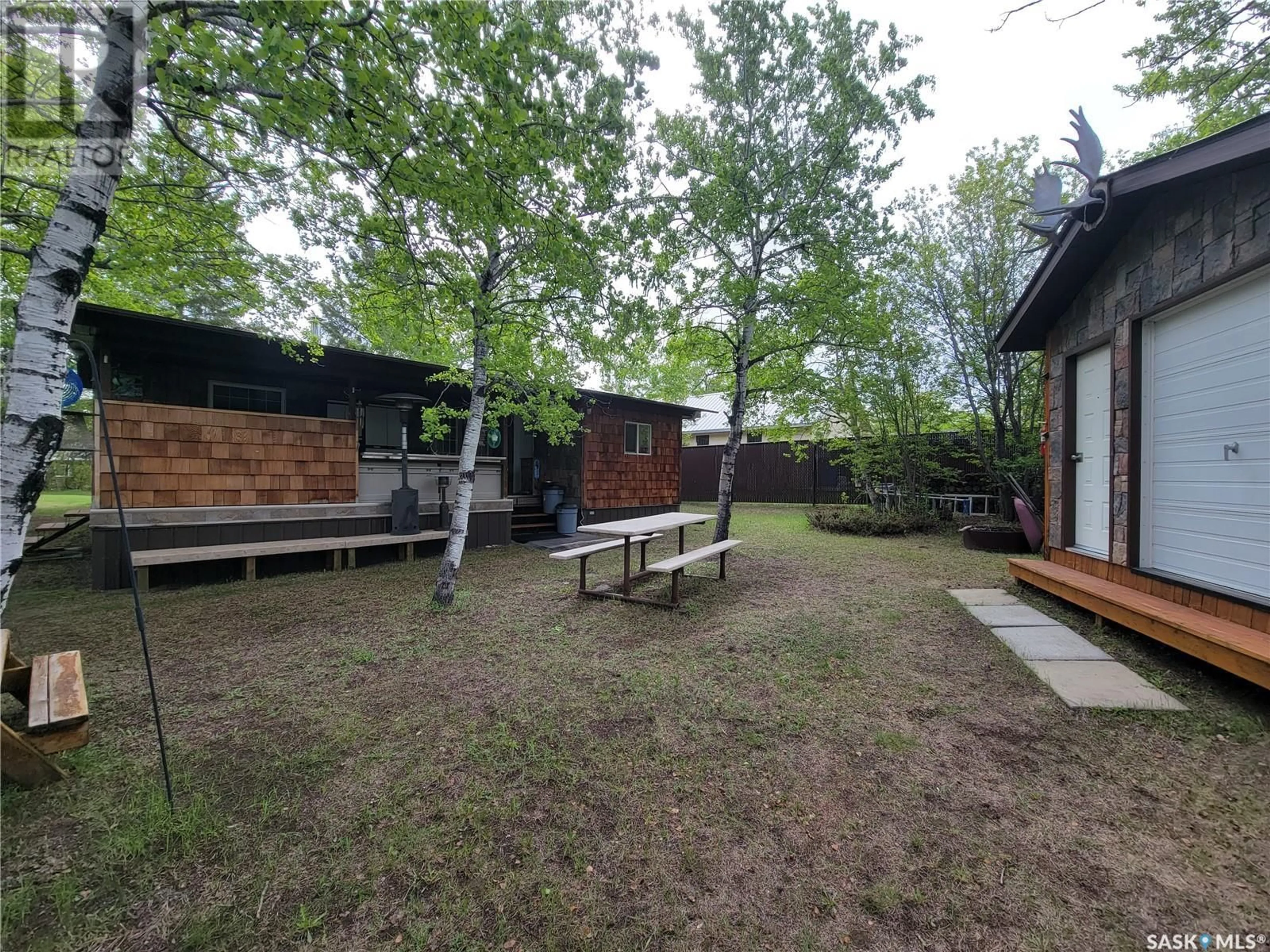 A pic from outside/outdoor area/front of a property/back of a property/a pic from drone, forest/trees view for 10 SUFFERN LAKE, Senlac Rm No. 411 Saskatchewan S0L2Y0