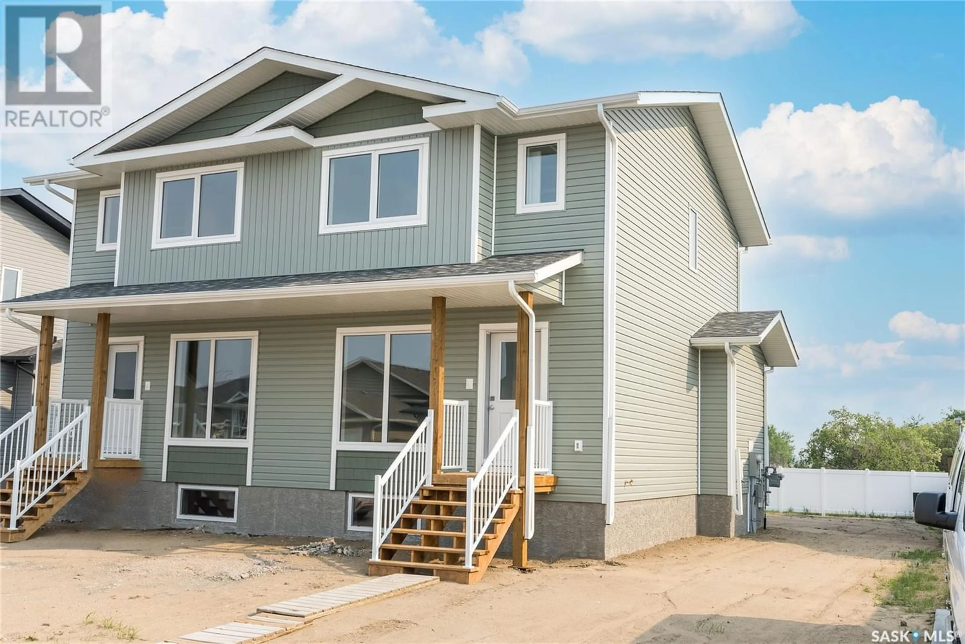 A pic from exterior of the house or condo for 309 Reddekopp CRESCENT, Warman Saskatchewan S0K4S3