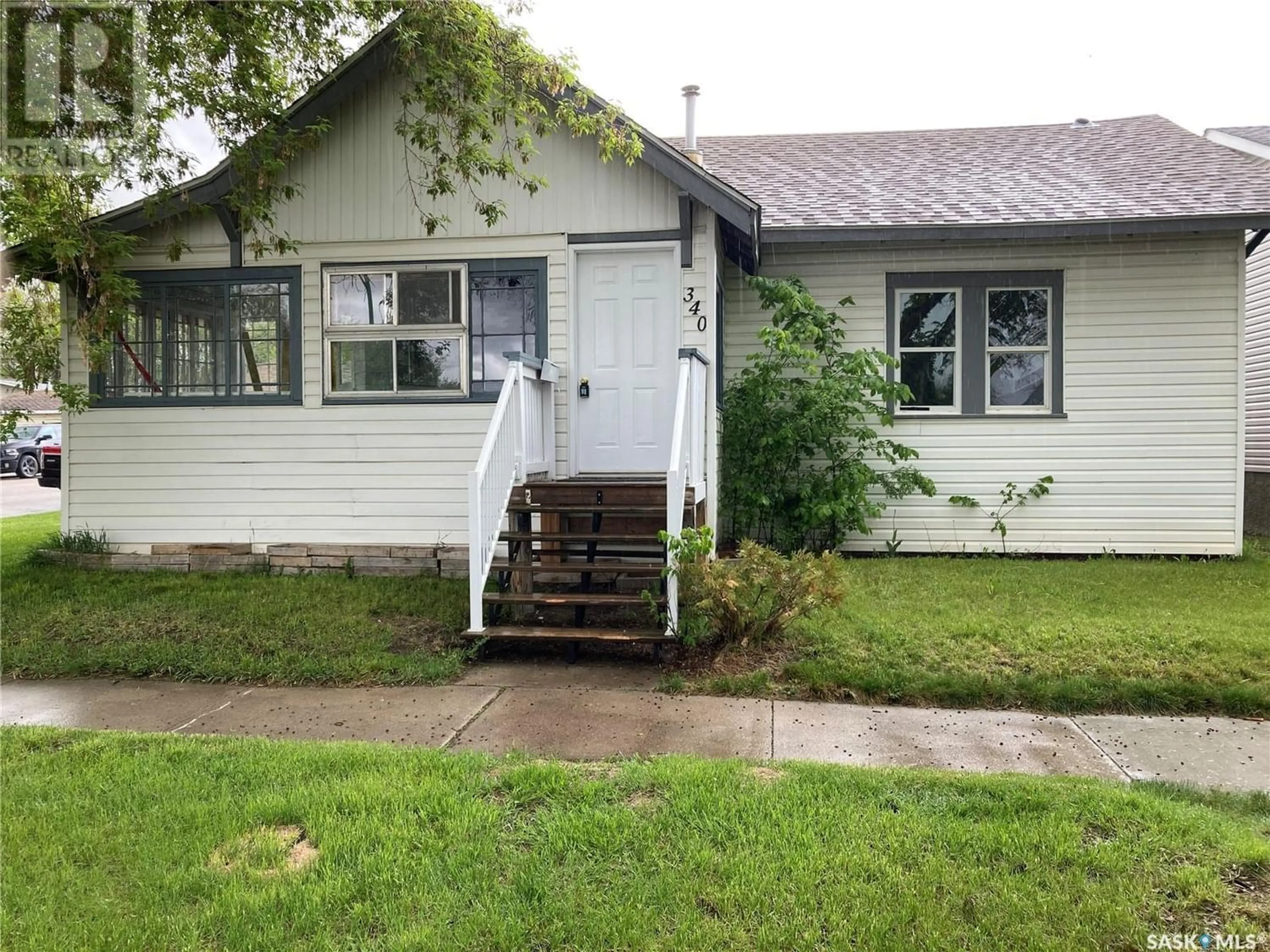 Frontside or backside of a home for 340 J AVENUE N, Saskatoon Saskatchewan S7L2K3