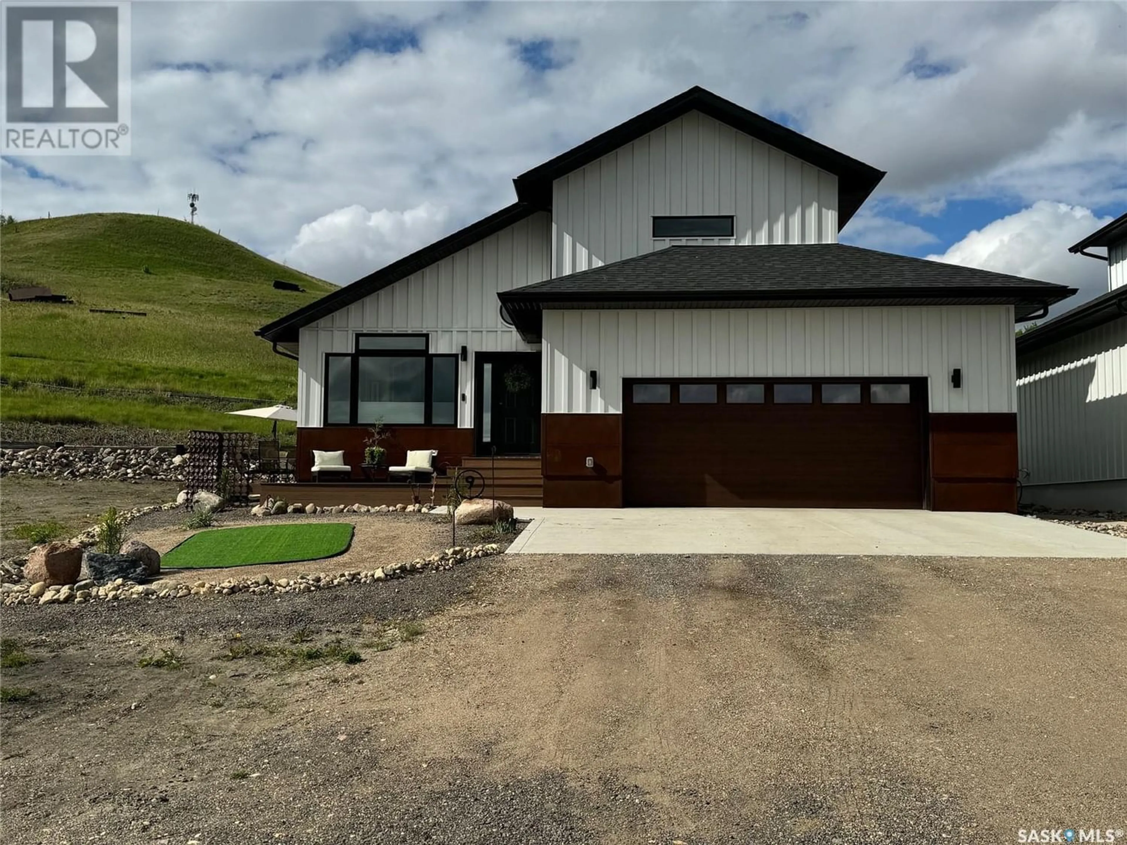 Frontside or backside of a home for 9 70 8th AVENUE, Lumsden Saskatchewan S0G3C0