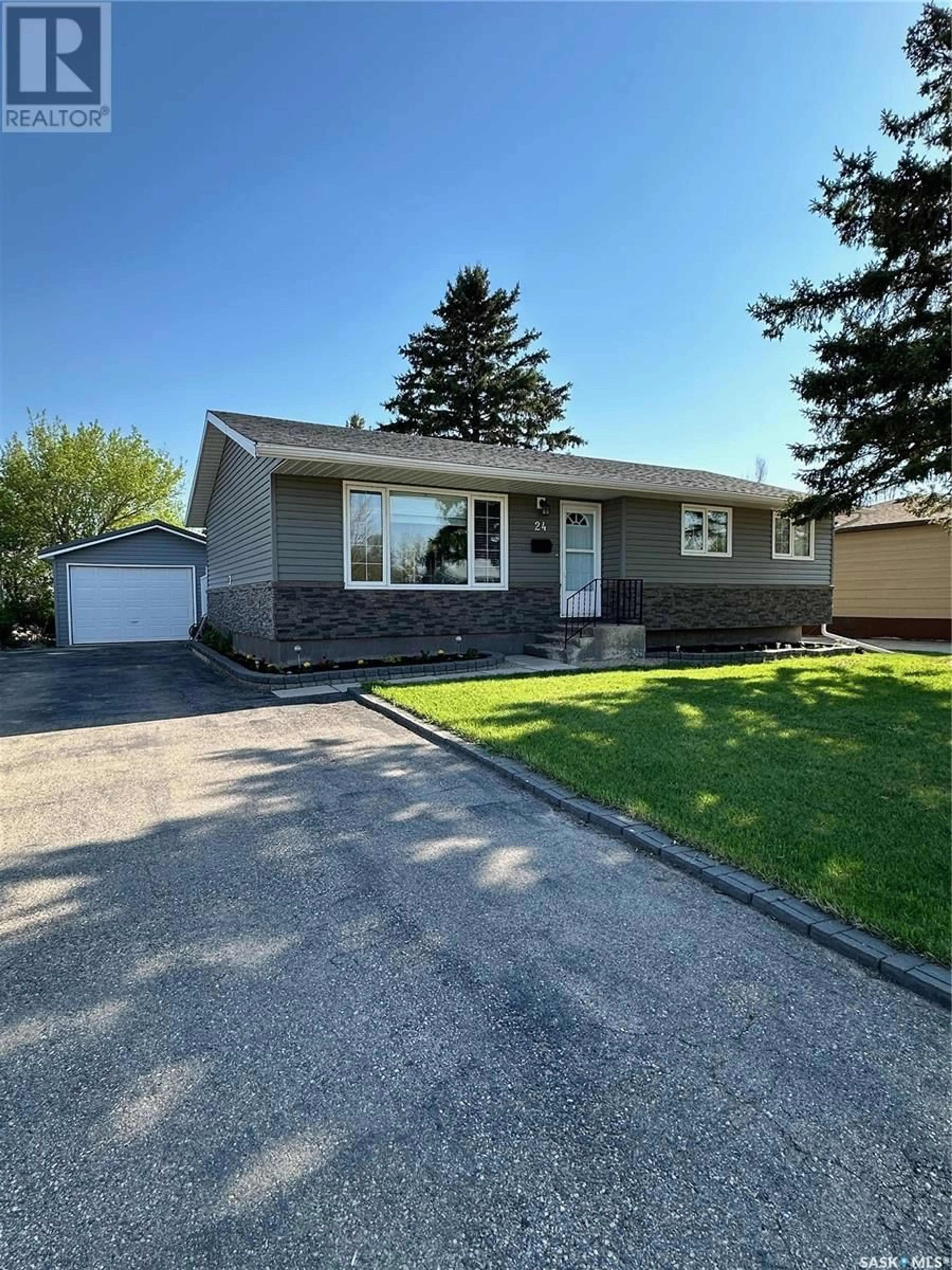 Frontside or backside of a home for 24 Mitchell CRESCENT, Weyburn Saskatchewan S4H2M4