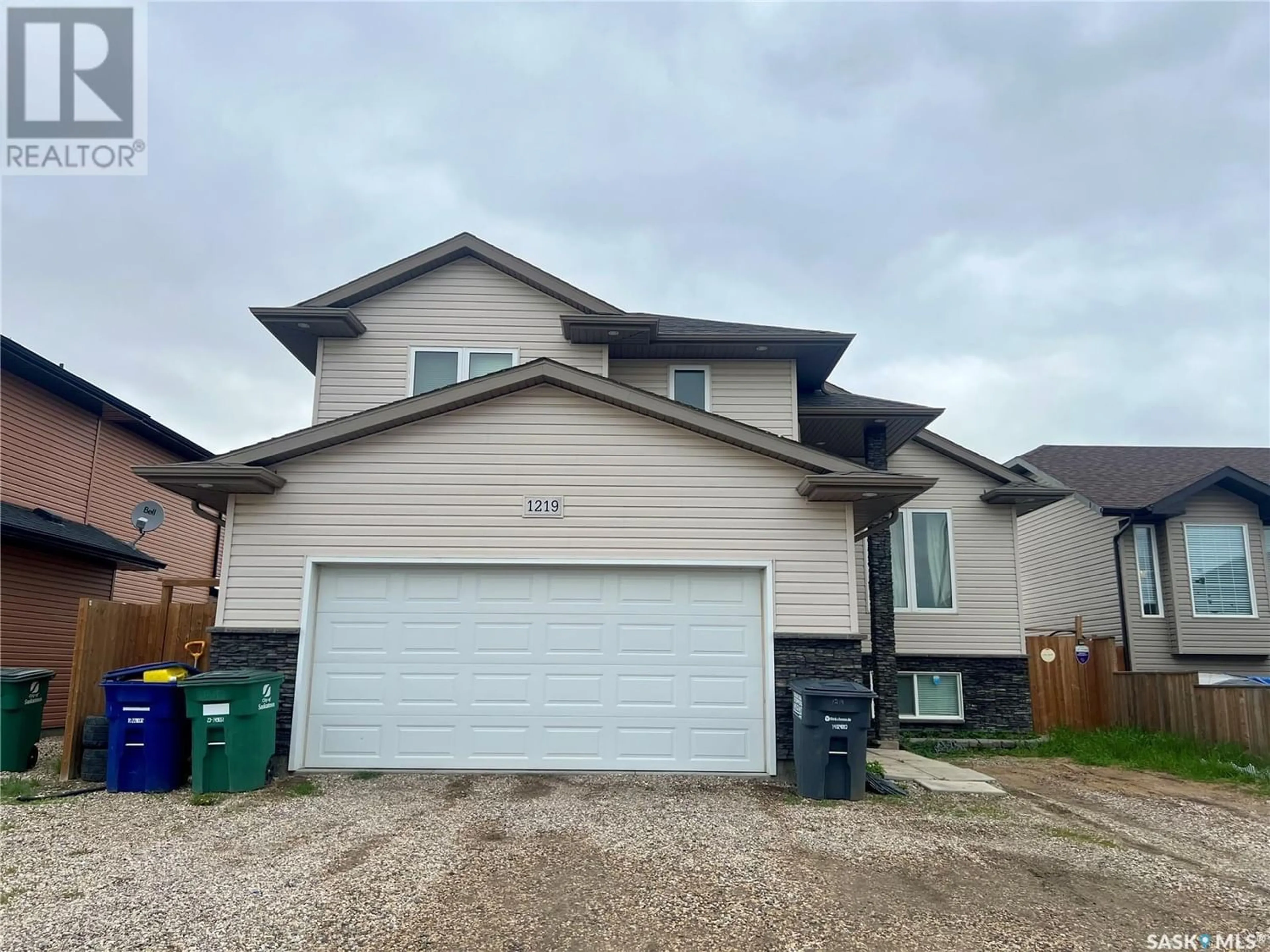 Frontside or backside of a home for 1219 Hargreaves WAY, Saskatoon Saskatchewan S7R0H1