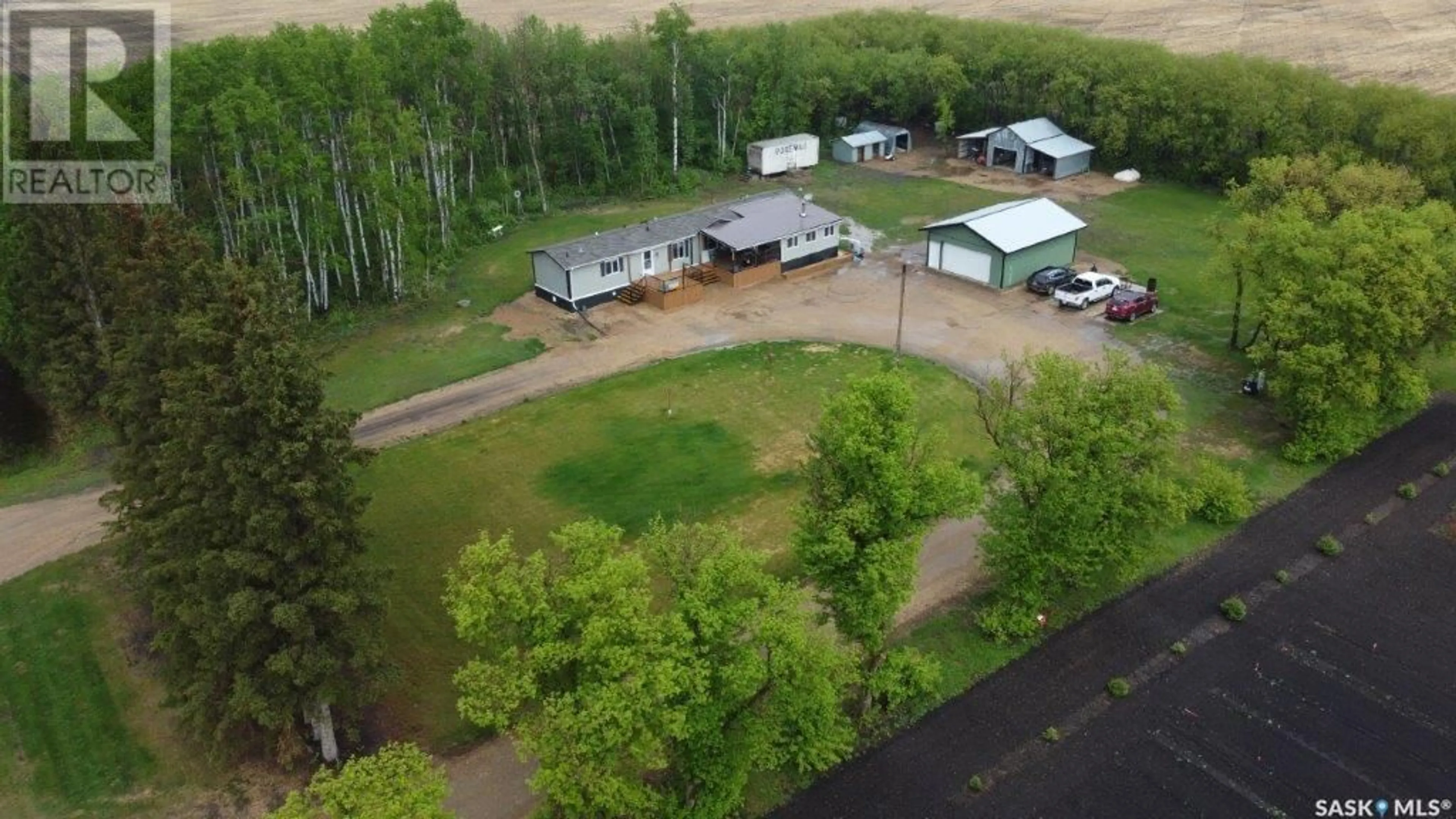 A pic from outside/outdoor area/front of a property/back of a property/a pic from drone, water/lake/river/ocean view for 5.13 acres, Livingston Rm No. 331 Saskatchewan S0A0B0