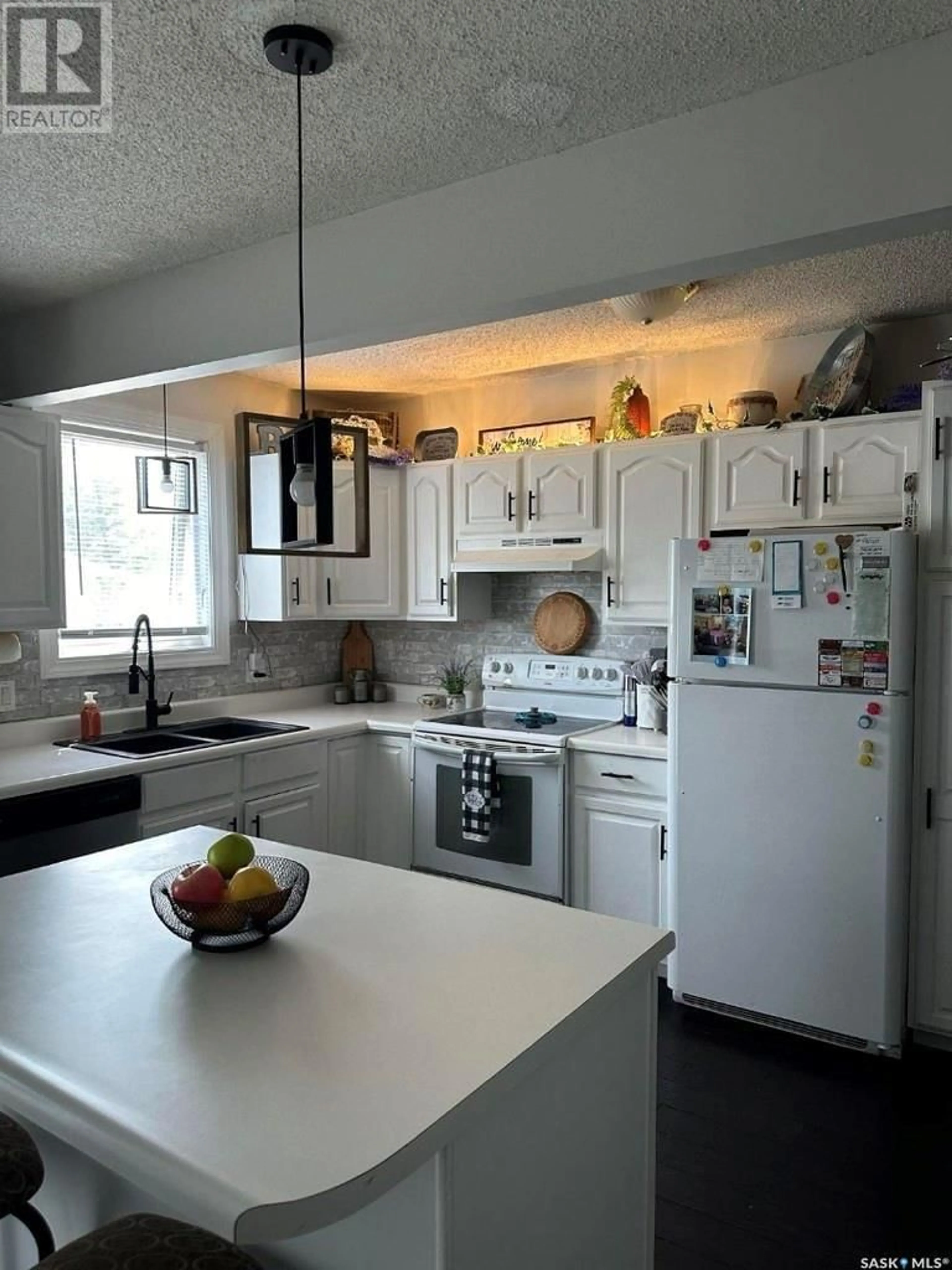 Open concept kitchen for 100 Pacific AVENUE, Carievale Saskatchewan S0C0P0