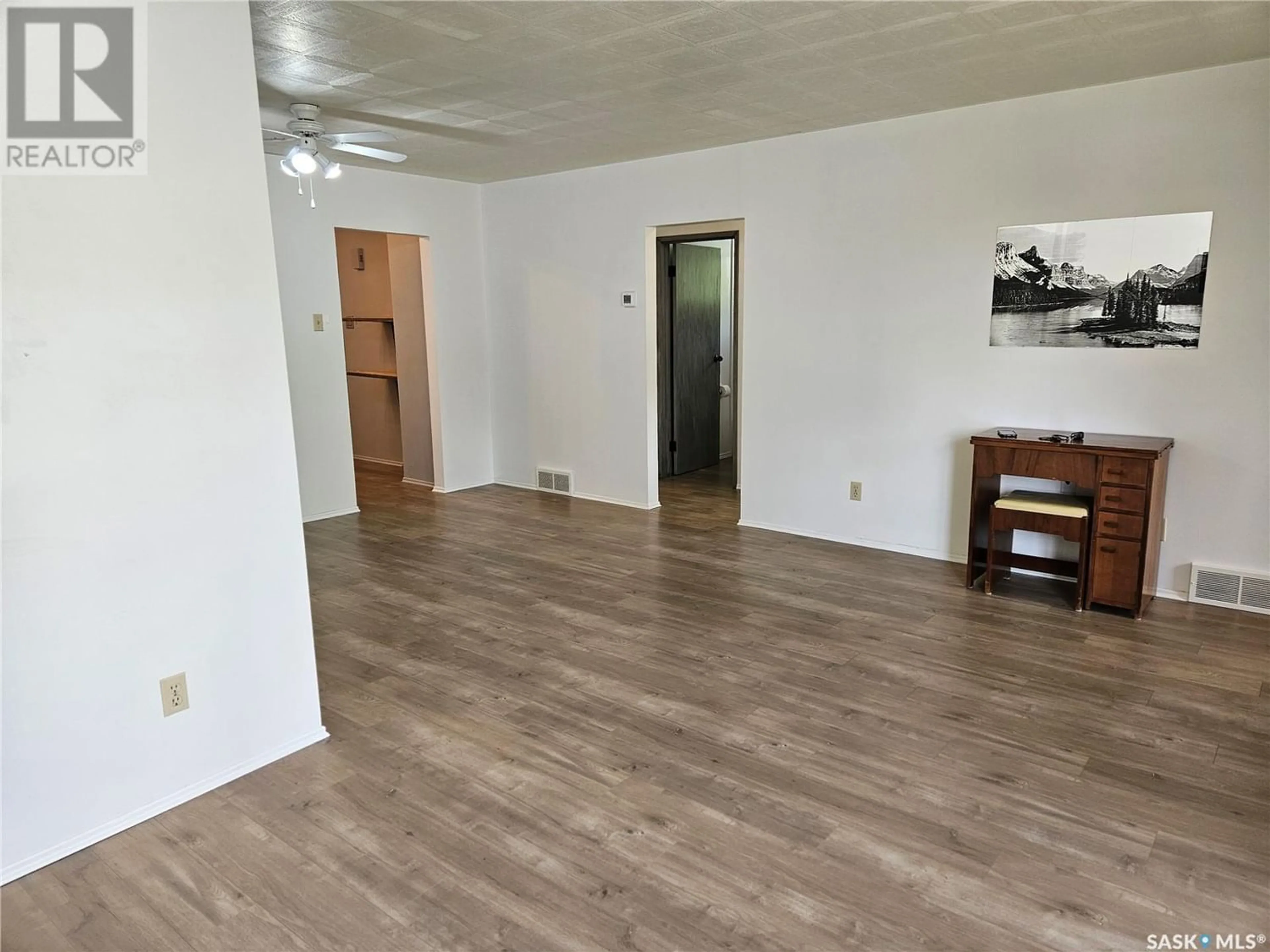 A pic of a room, wood floors for 122 4th AVENUE NE, Swift Current Saskatchewan S9H2J2