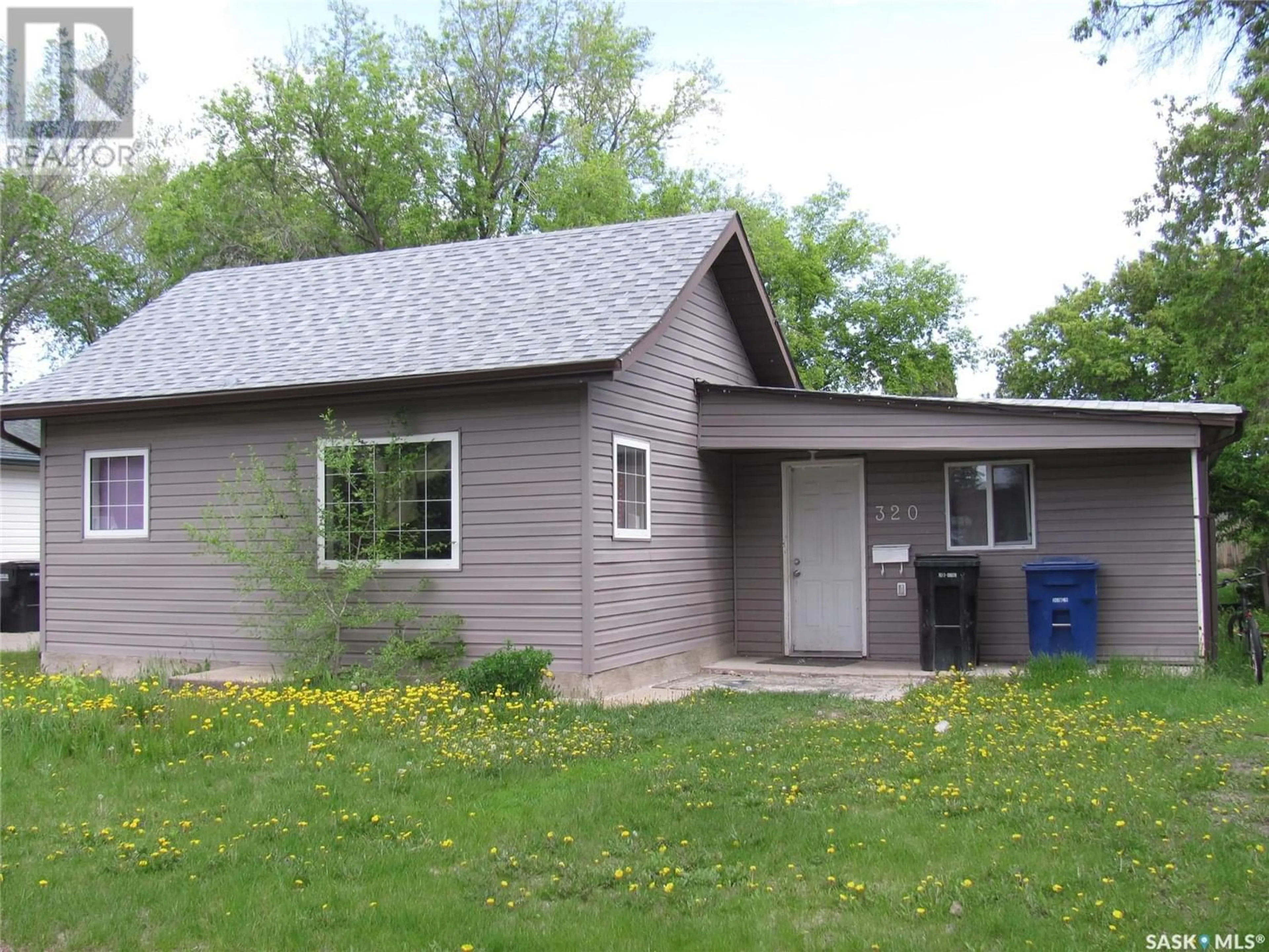 Frontside or backside of a home for 320 Ottawa AVENUE S, Saskatoon Saskatchewan S7M3L7