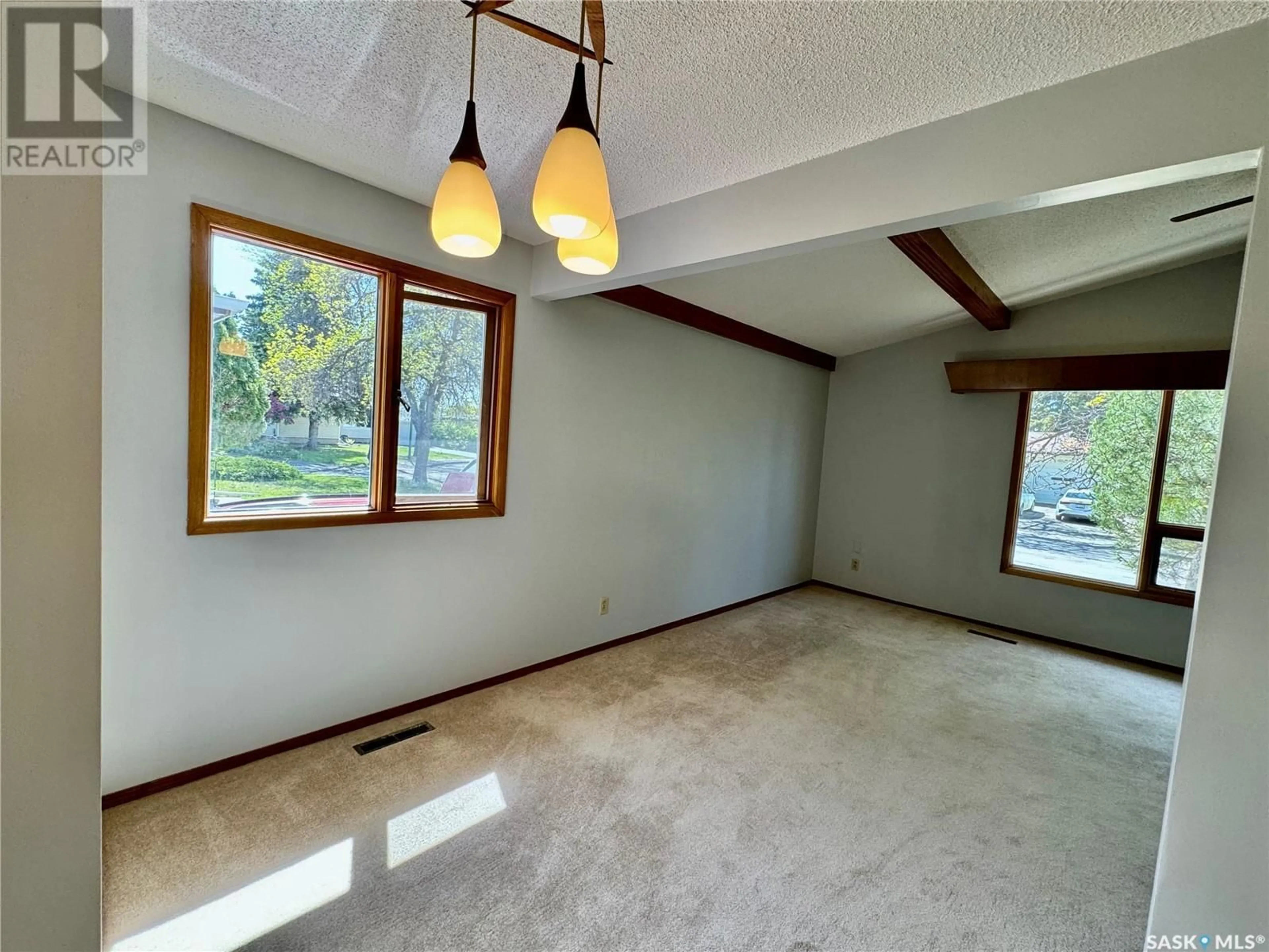 A pic of a room, wood floors for 81 Mossfield PLACE, Yorkton Saskatchewan S3N2R1