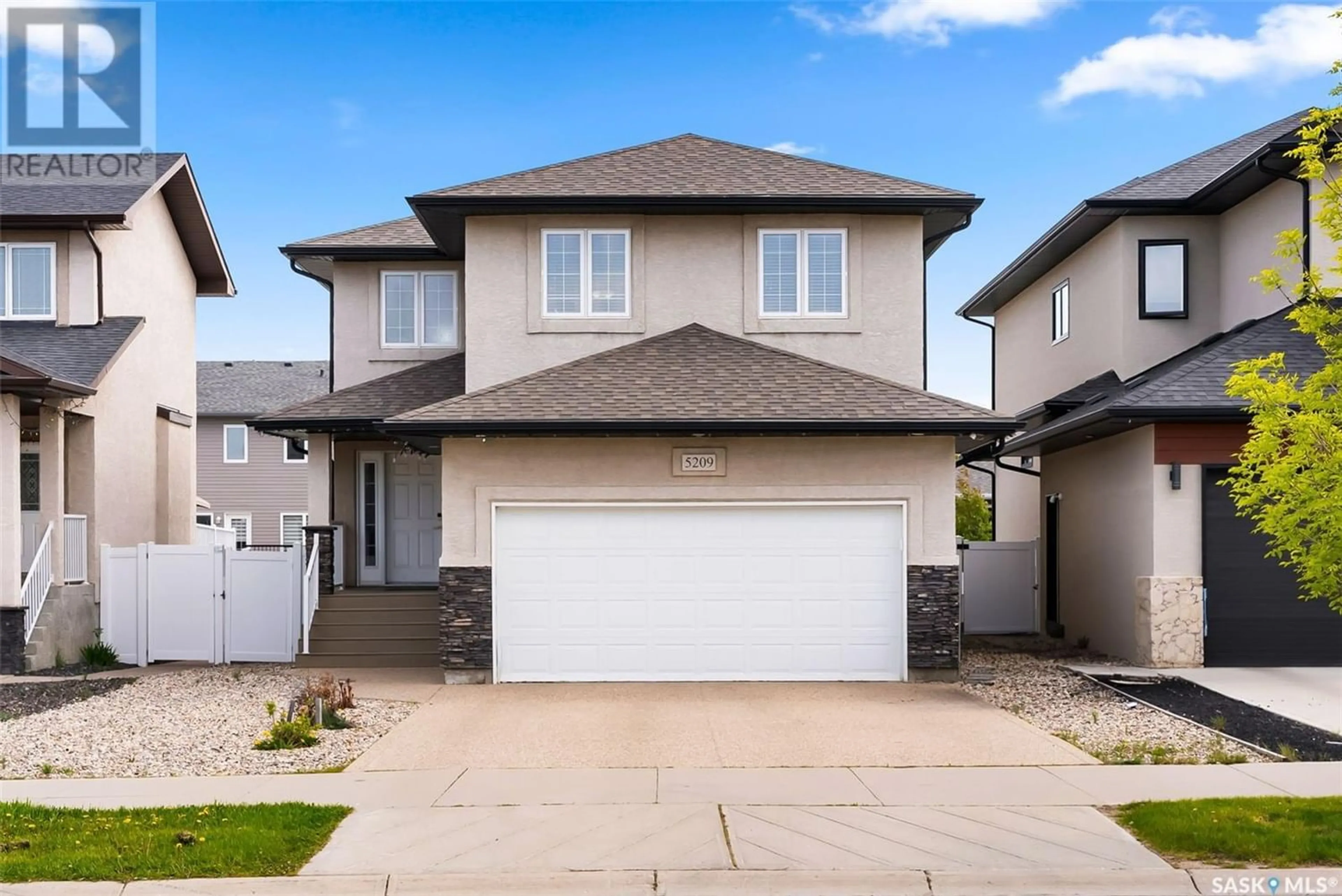 Frontside or backside of a home for 5209 Tutor WAY, Regina Saskatchewan S4W0H4