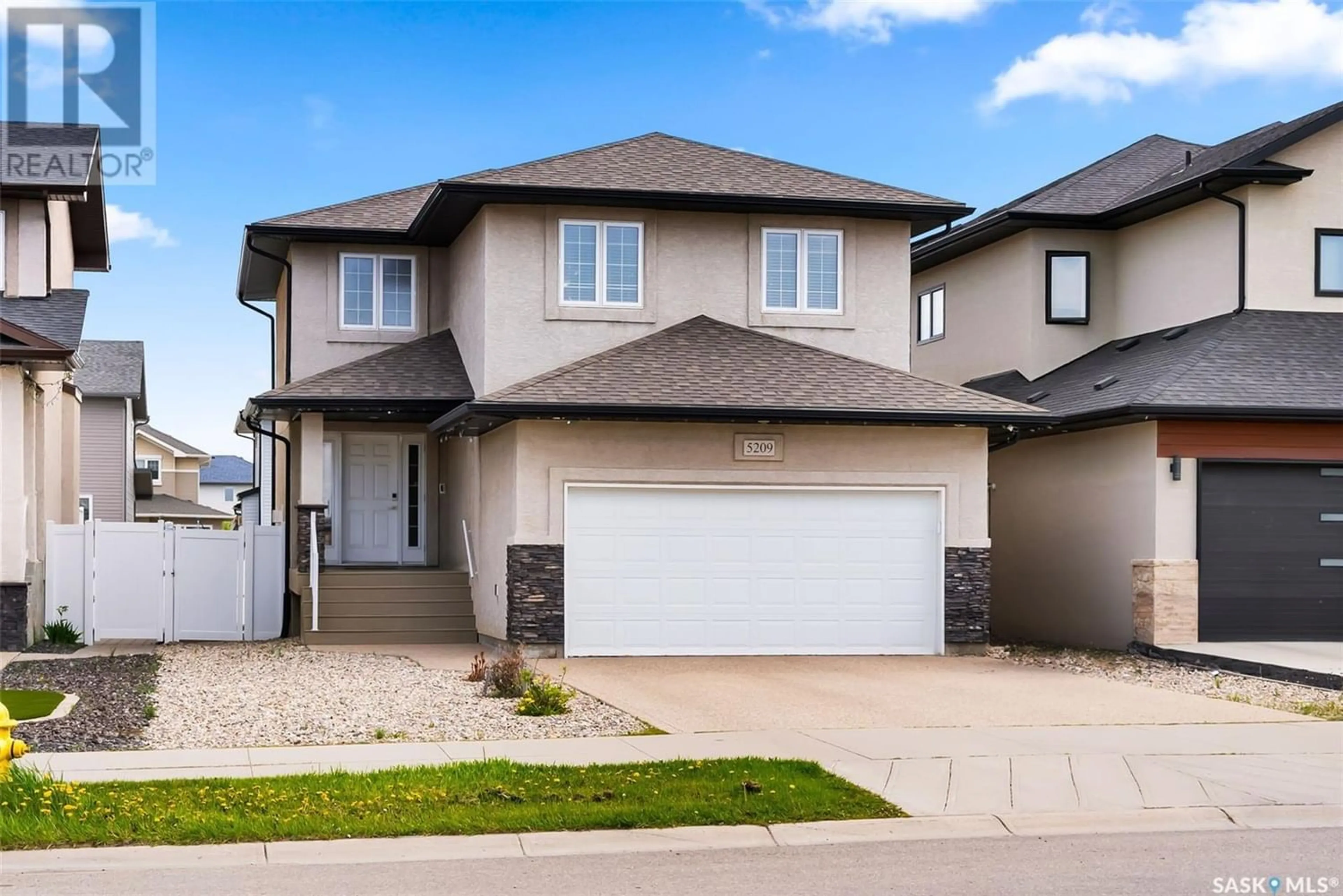 Frontside or backside of a home for 5209 Tutor WAY, Regina Saskatchewan S4W0H4