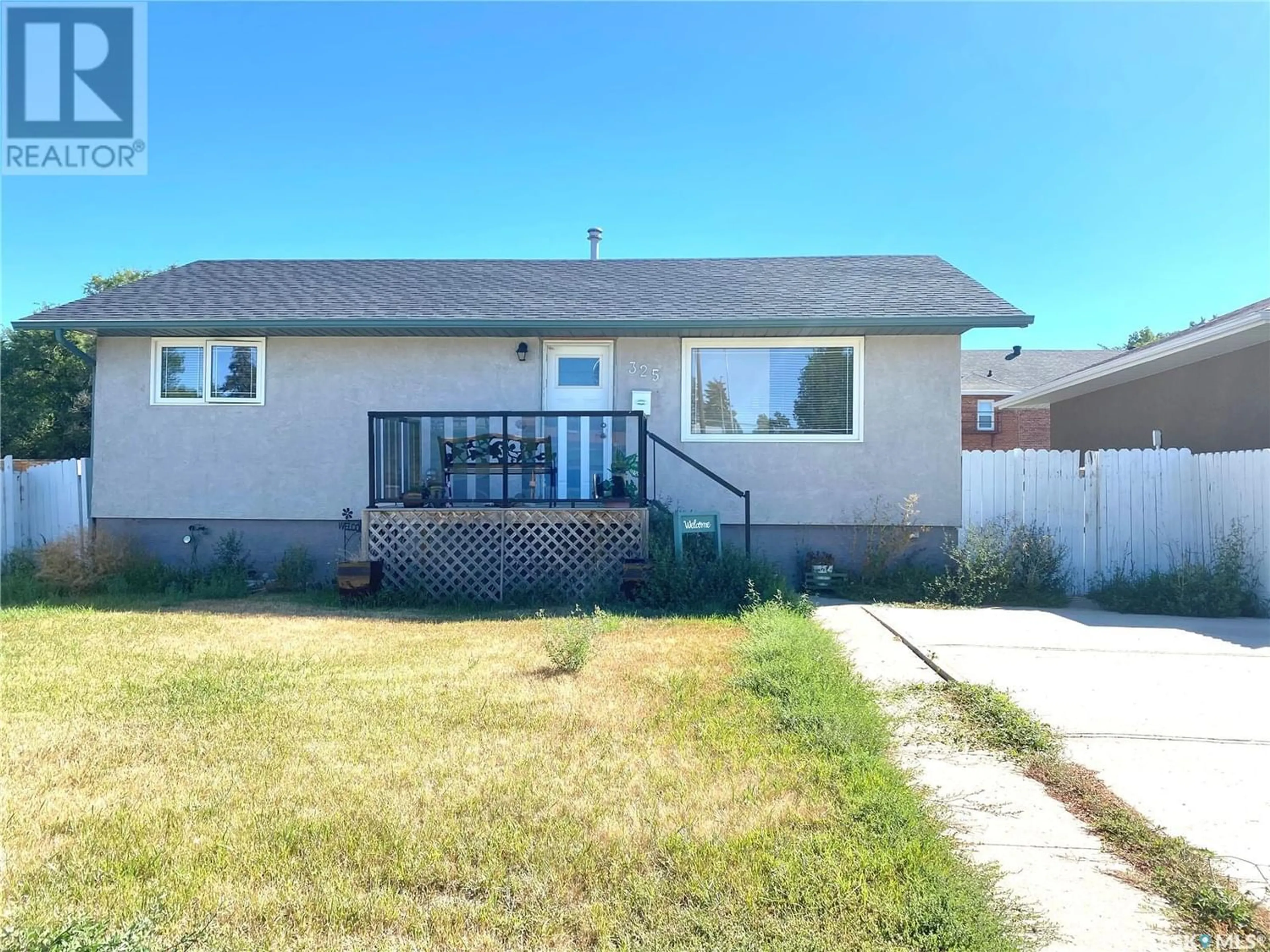 Frontside or backside of a home for 325 2nd AVENUE NW, Swift Current Saskatchewan S9H0P5