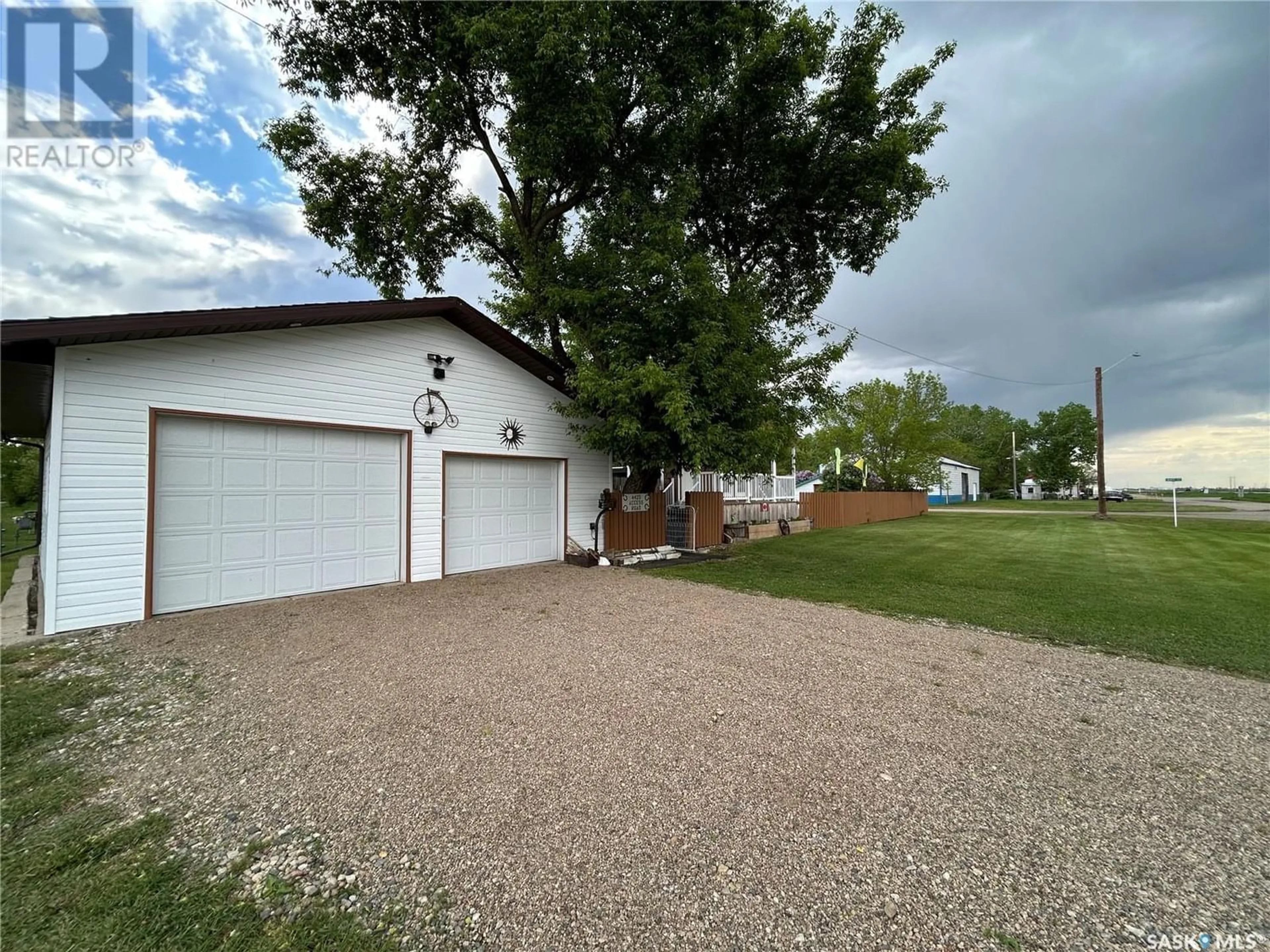 Frontside or backside of a home, the fenced backyard for 4425 Access ROAD, Halbrite Saskatchewan S0C1H0