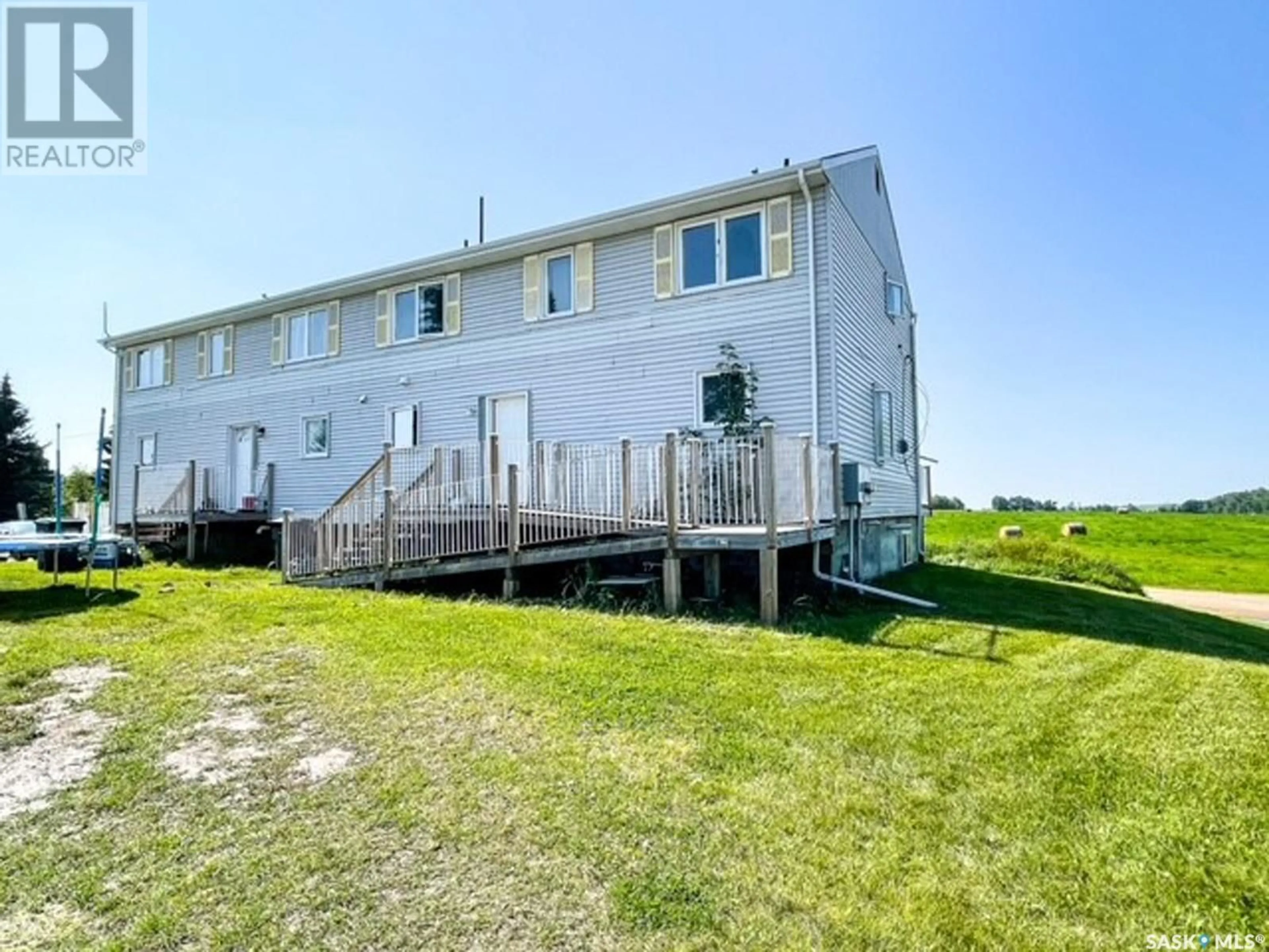A pic from outside/outdoor area/front of a property/back of a property/a pic from drone, water/lake/river/ocean view for 108 MAIN STREET, Dorintosh Saskatchewan S0M0T0