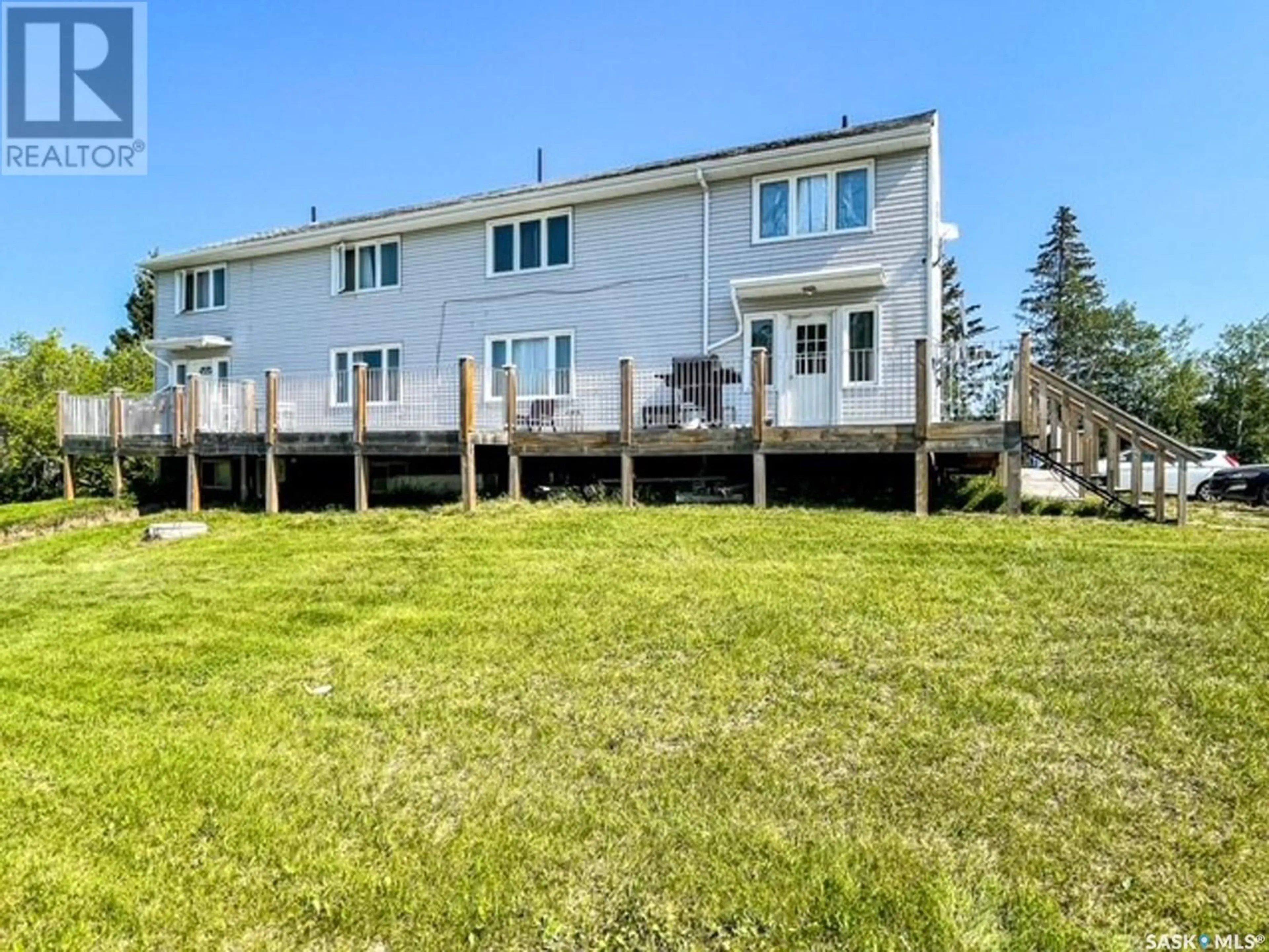 A pic from outside/outdoor area/front of a property/back of a property/a pic from drone, water/lake/river/ocean view for 108 MAIN STREET, Dorintosh Saskatchewan S0M0T0