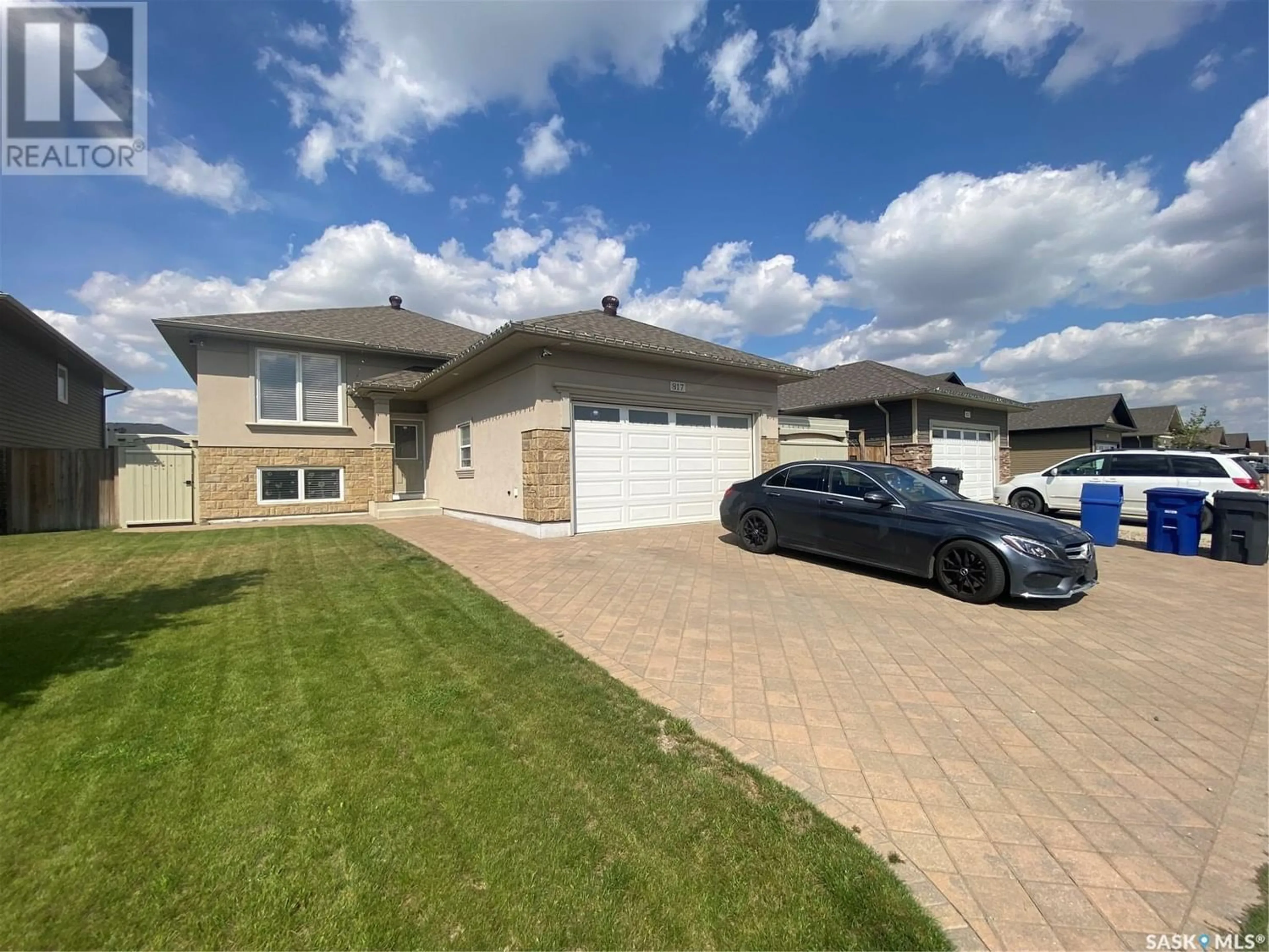 Frontside or backside of a home for 817 Reimer ROAD, Martensville Saskatchewan S0K0A2