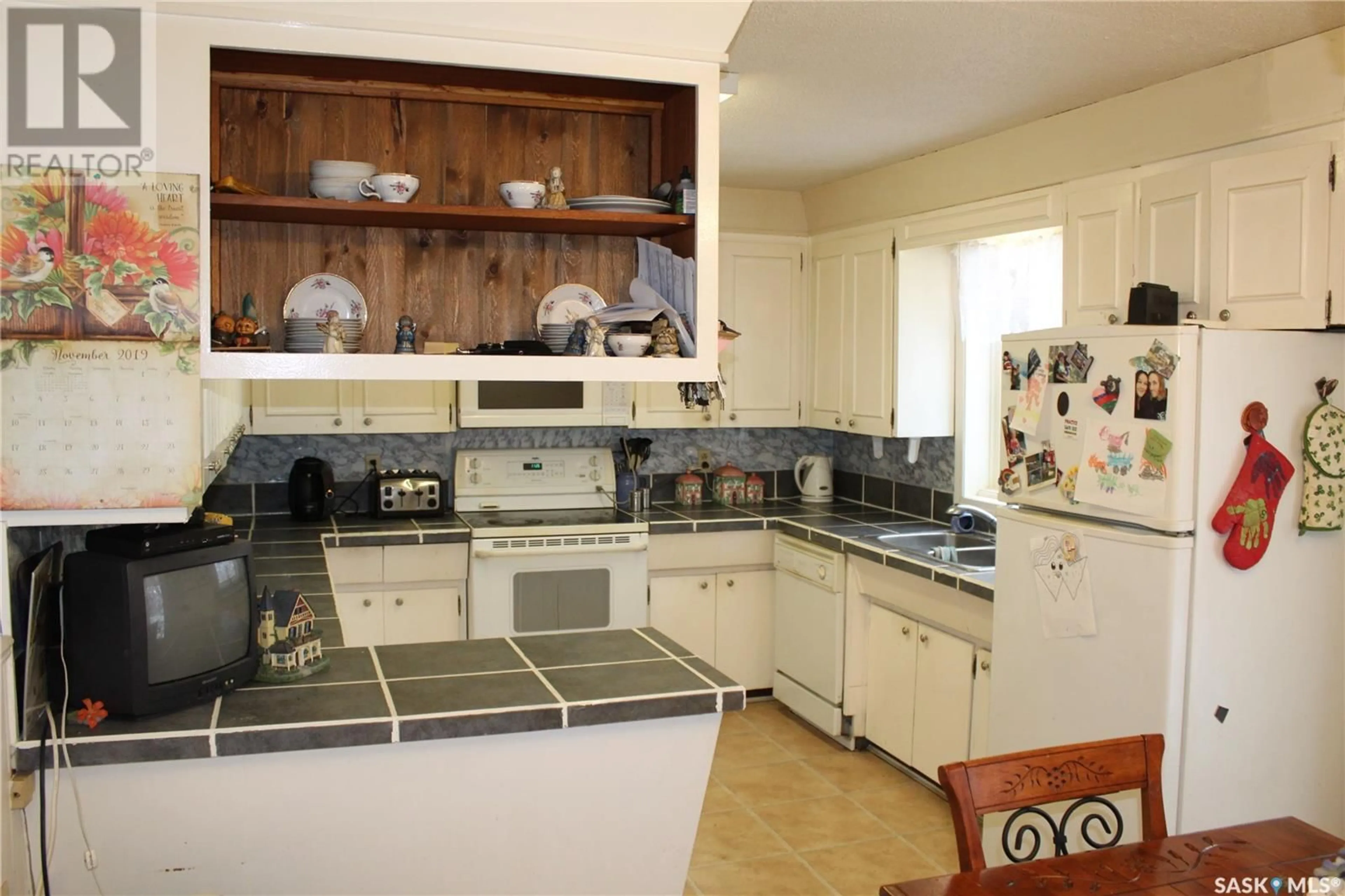 Standard kitchen, ceramic/tile floor for 47 BANTRY STREET, Lanigan Saskatchewan S0K2M0