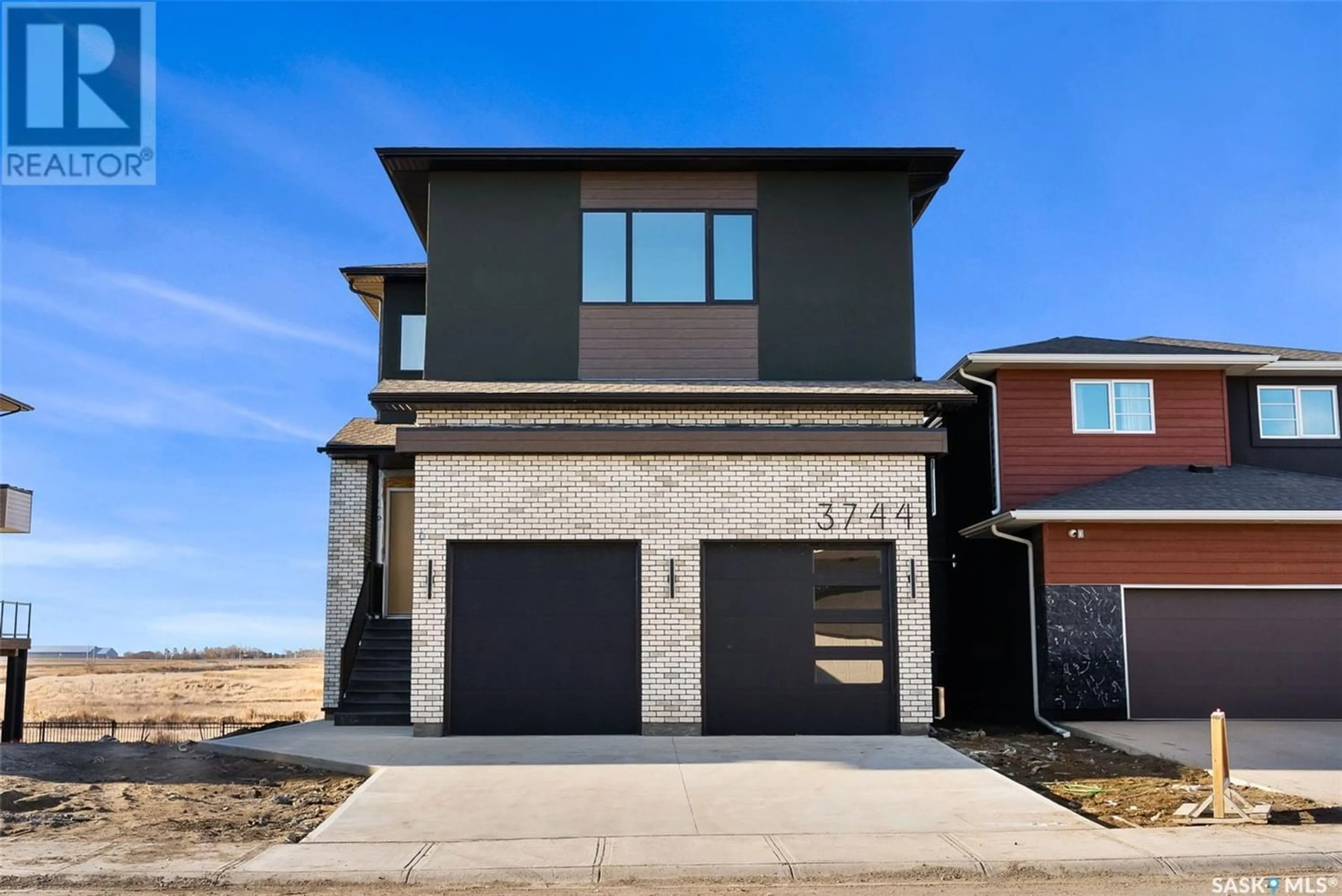 Home with brick exterior material for 3744 Gee CRESCENT, Regina Saskatchewan S4V3P1