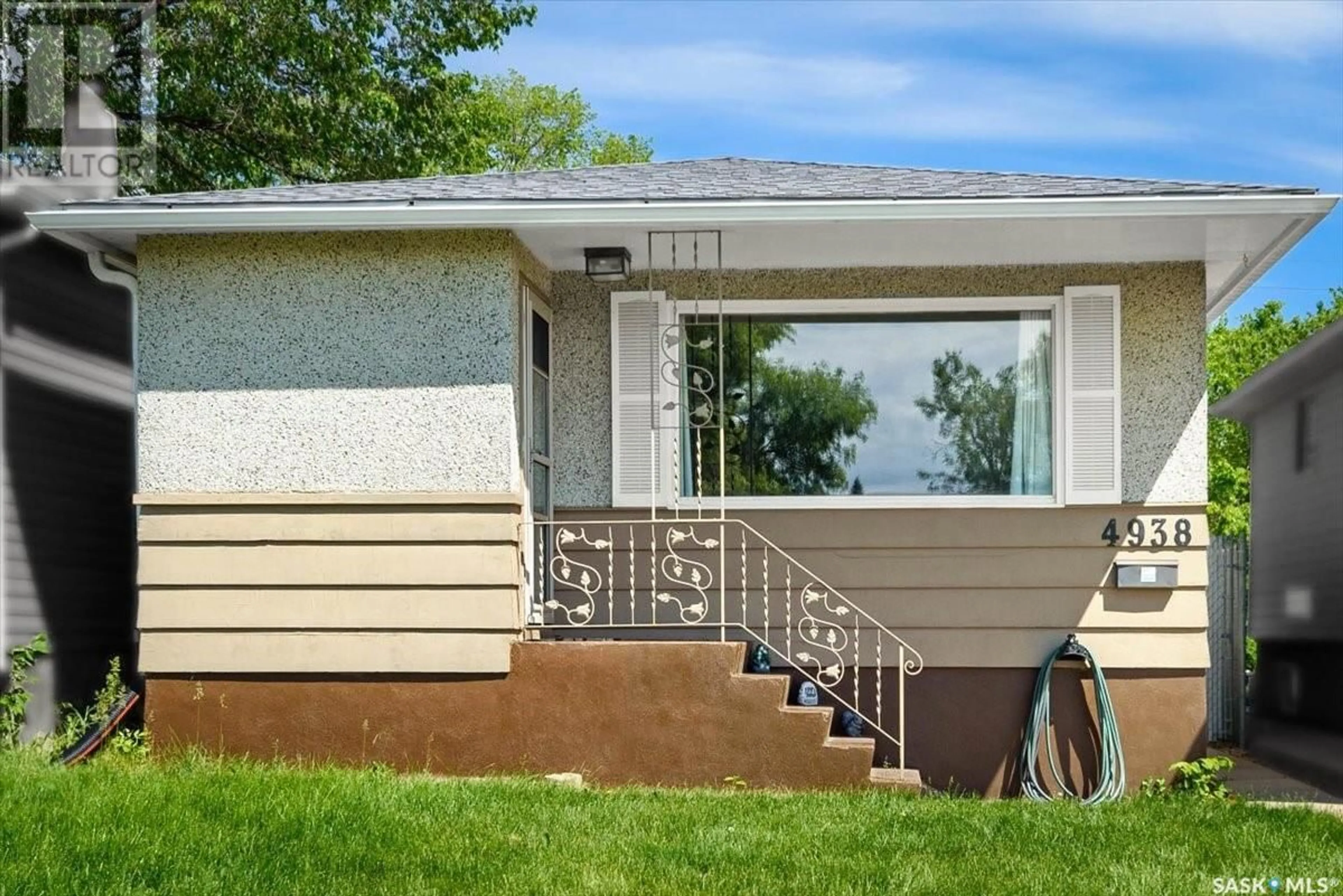 Home with vinyl exterior material for 4938 7TH AVENUE, Regina Saskatchewan S4T0R9