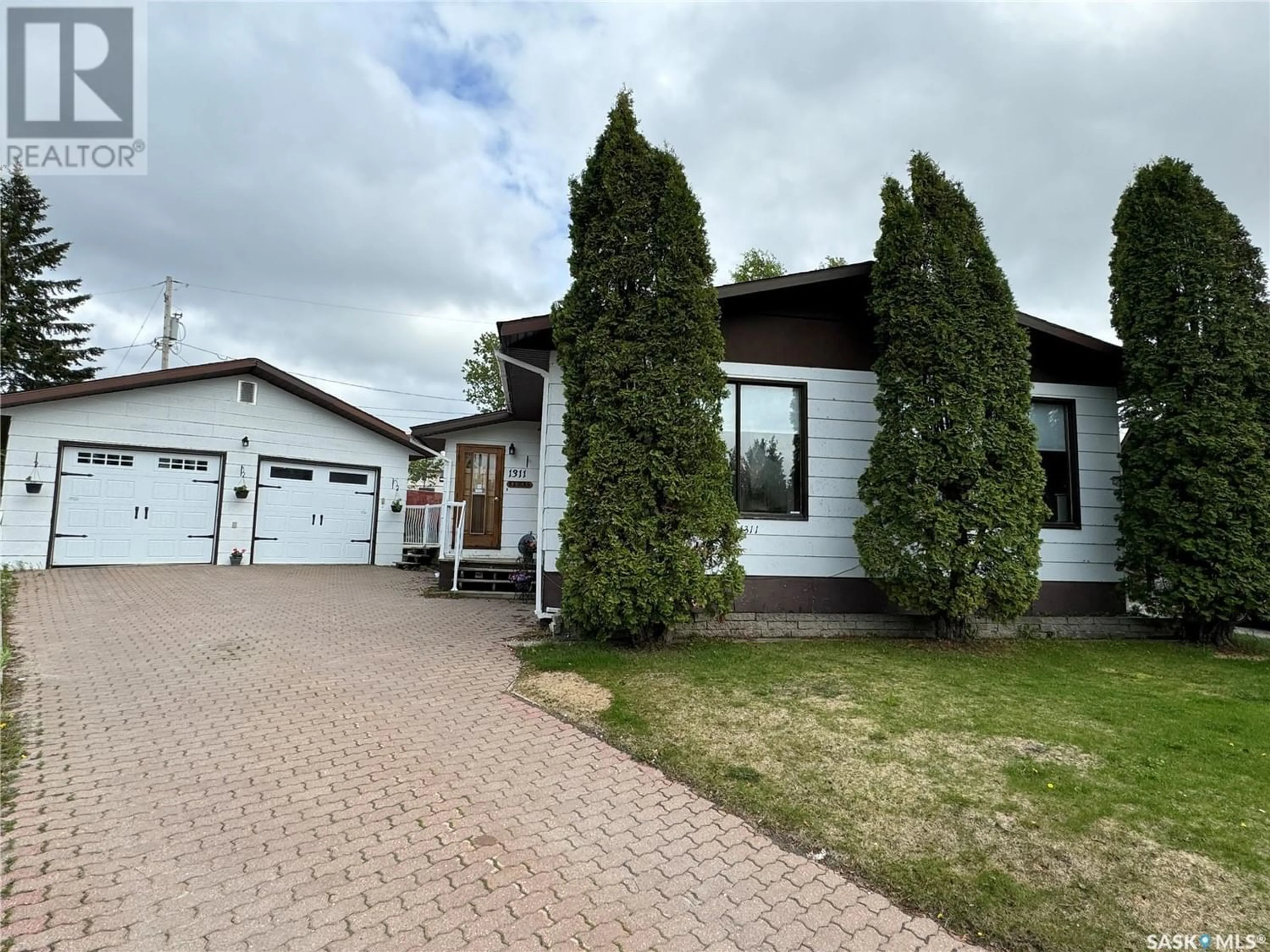 Frontside or backside of a home for 1311 Houghton PLACE, La Ronge Saskatchewan S0J1L0