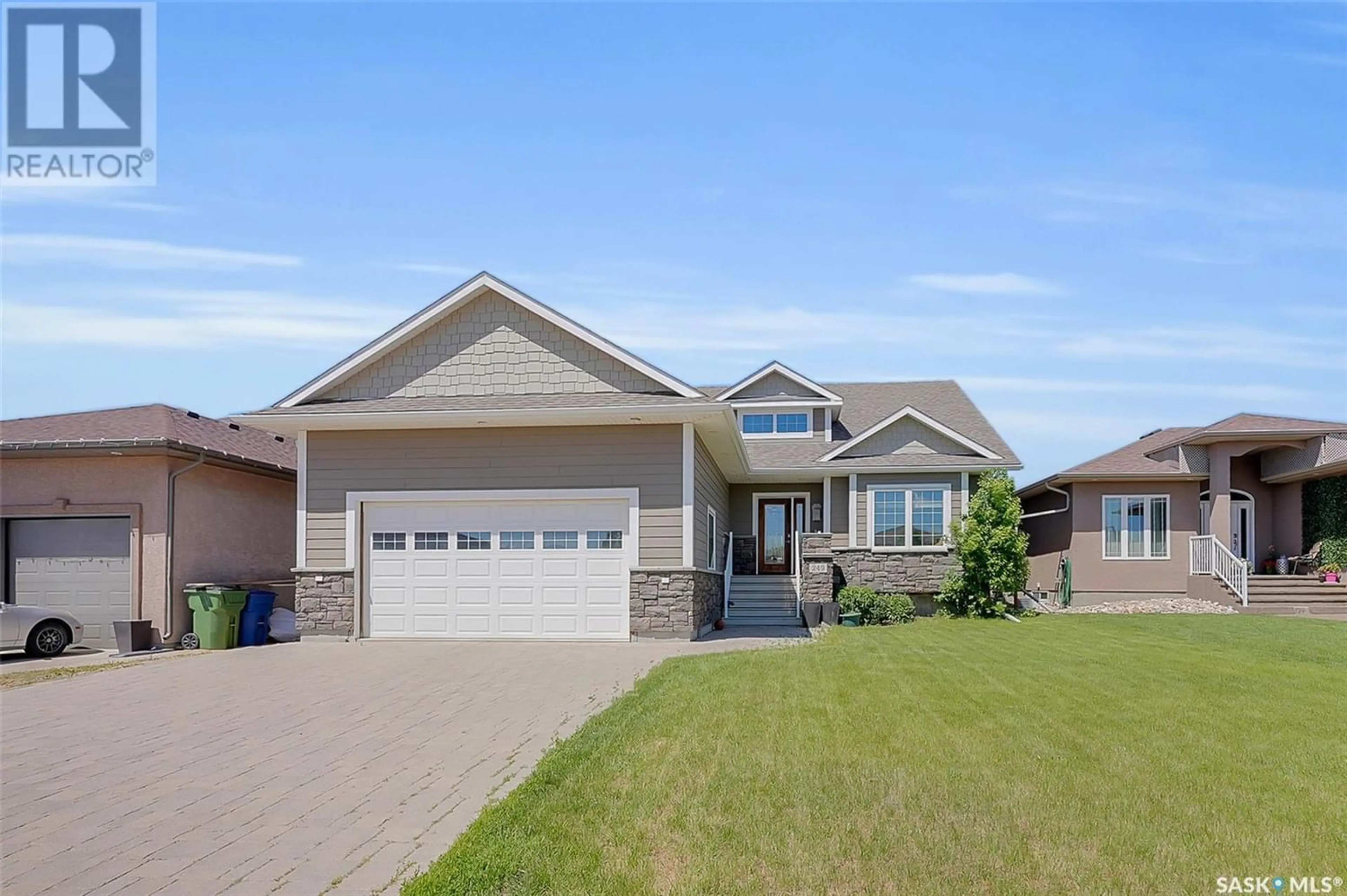 Frontside or backside of a home for 249 Wood Lily DRIVE, Moose Jaw Saskatchewan S6J0A3