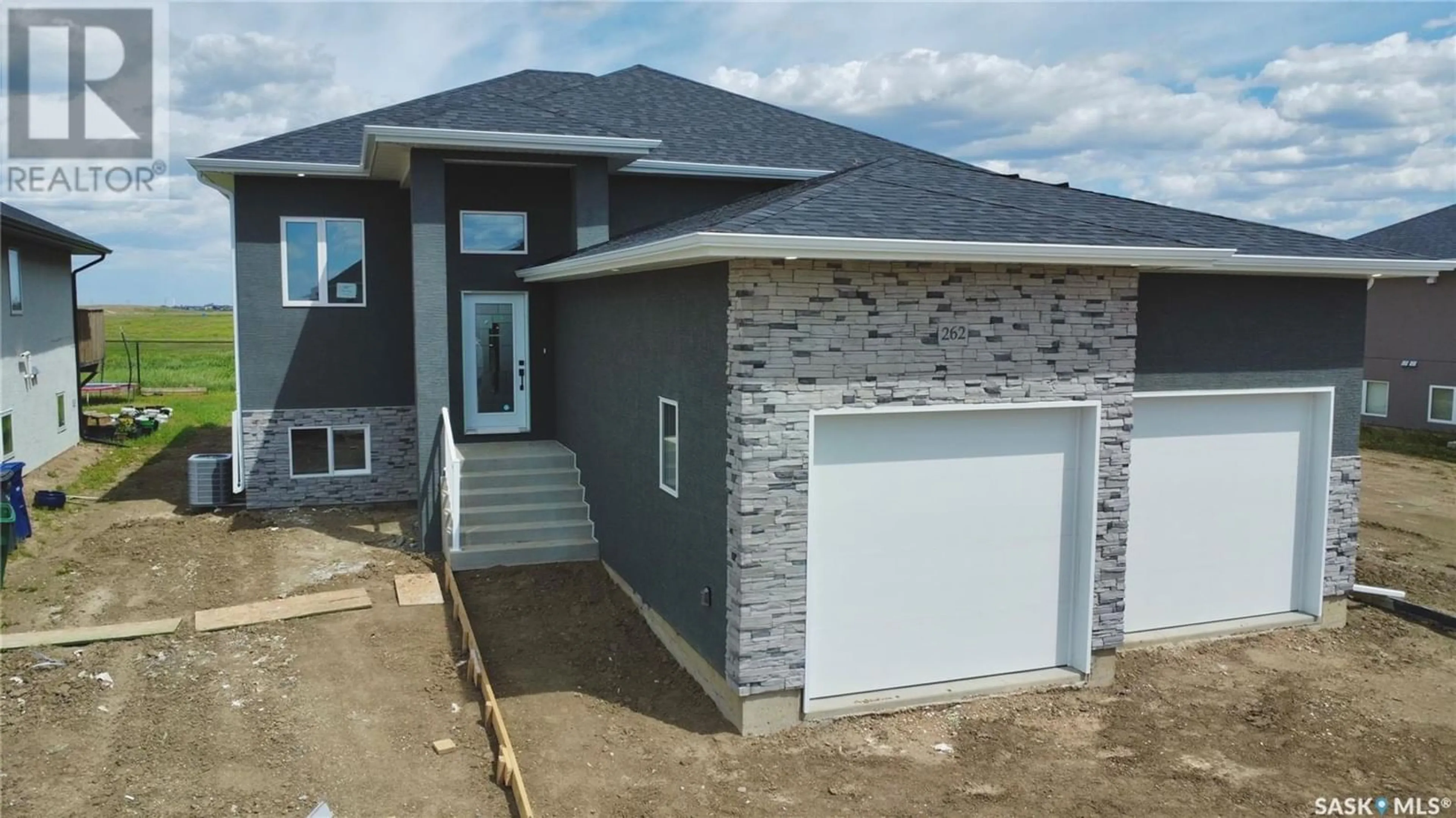 Frontside or backside of a home for 262 STROMBERG COURT, Saskatoon Saskatchewan S7L6M9
