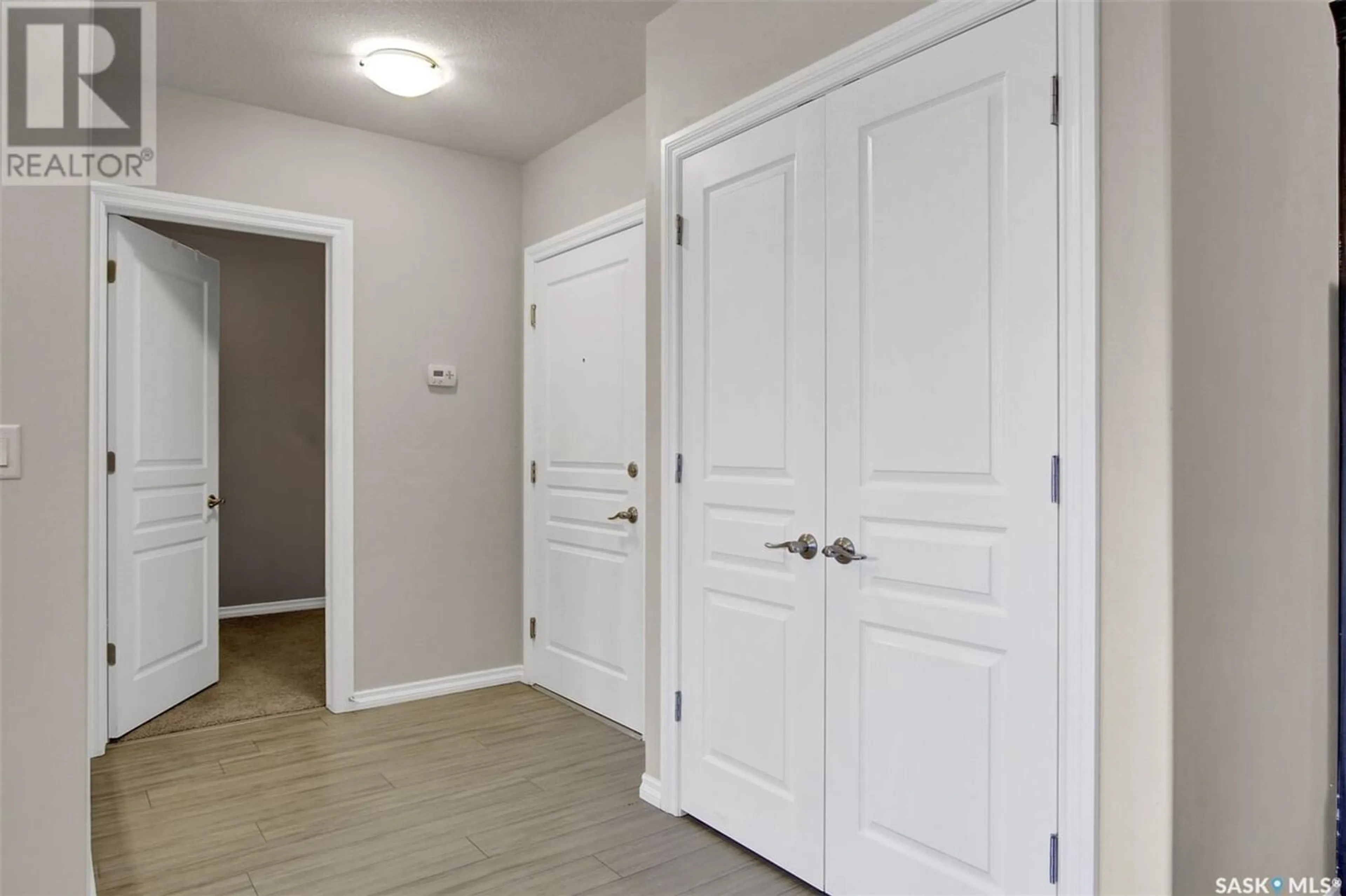 Indoor entryway, wood floors for 323 1715 Badham BOULEVARD, Regina Saskatchewan S4P0L9