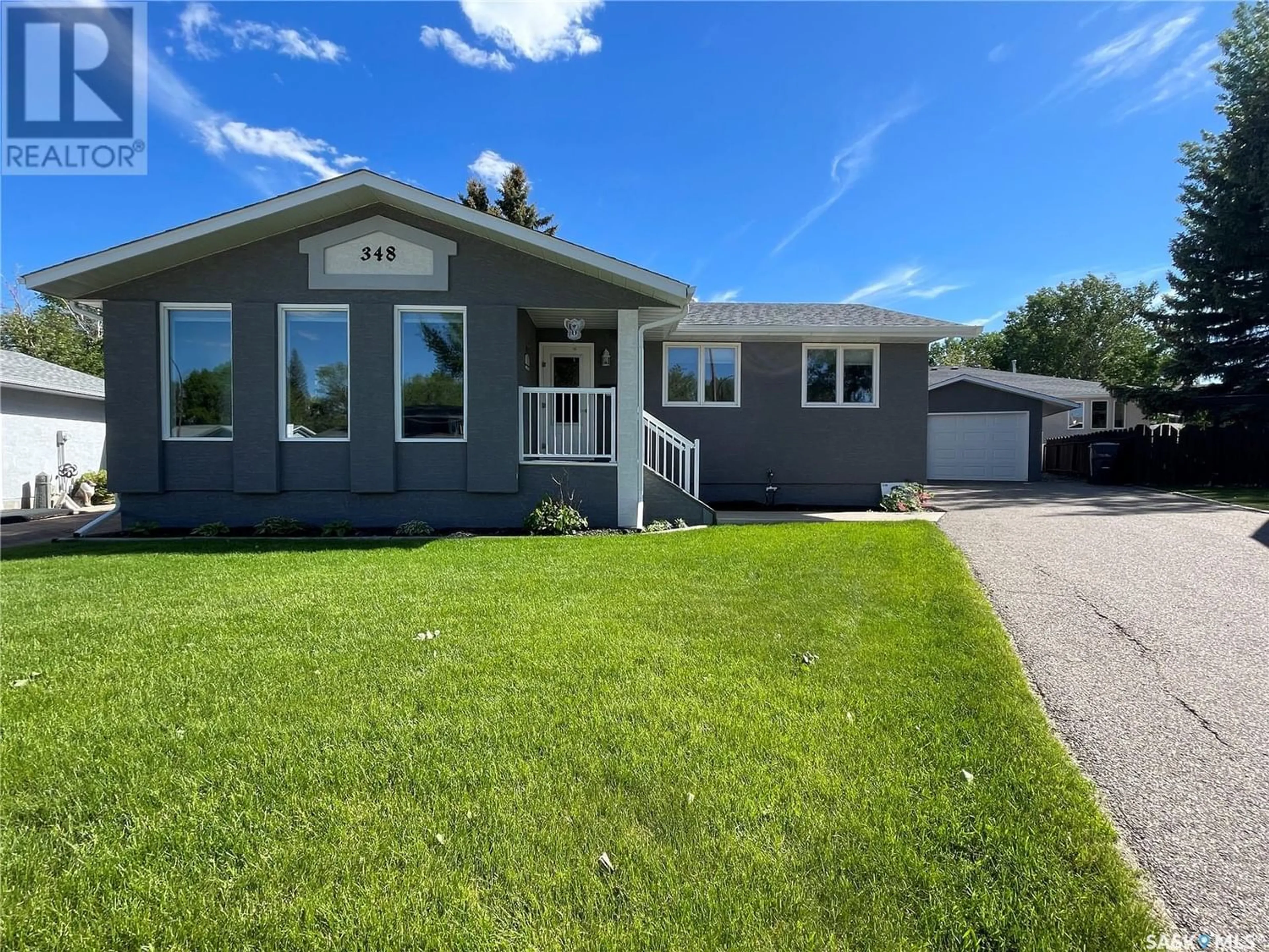 Frontside or backside of a home for 348 Powell CRESCENT, Swift Current Saskatchewan S9H4L7