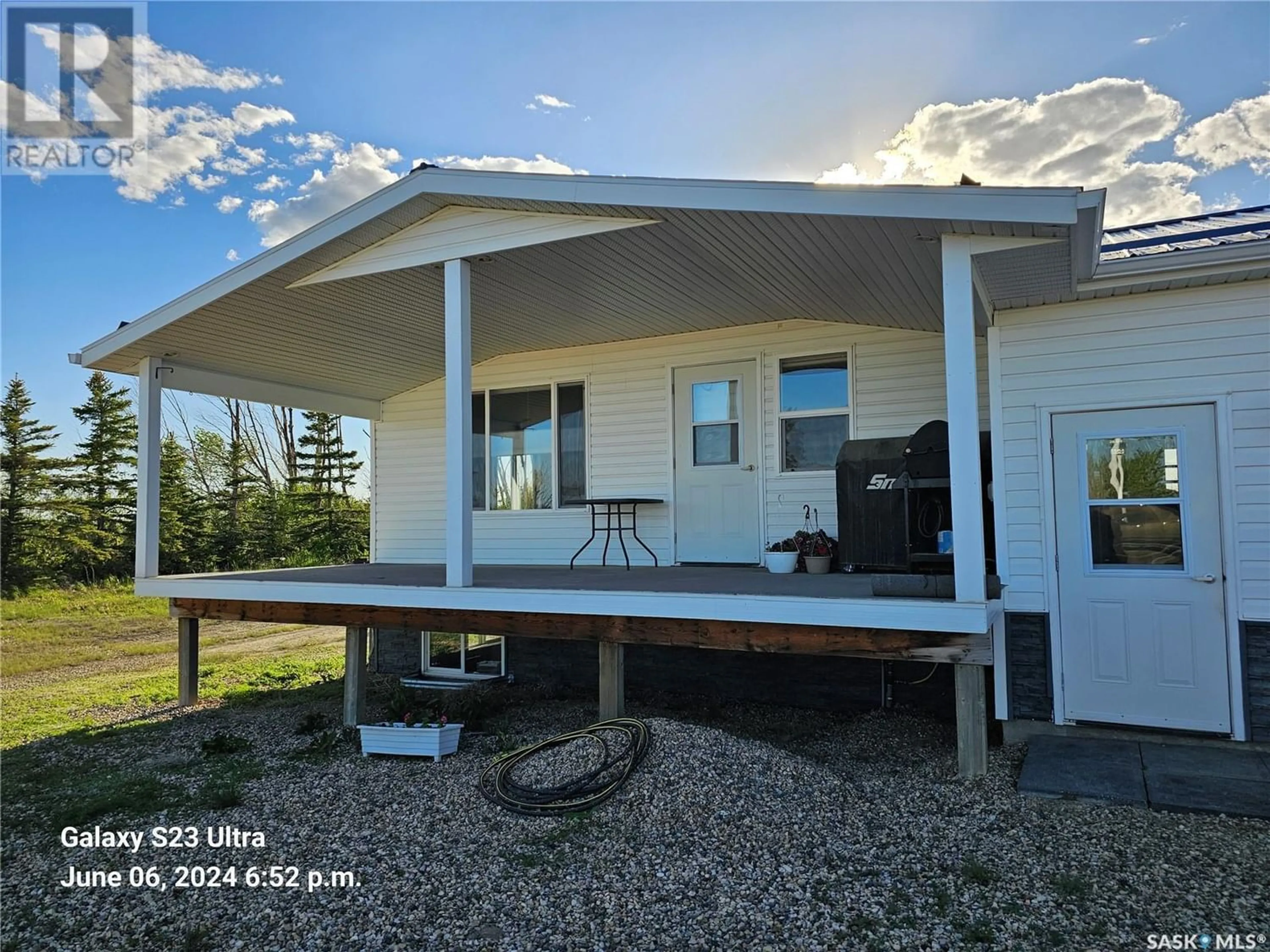 Home with vinyl exterior material for Blutcher Acreage, Blucher Rm No. 343 Saskatchewan S7K1P3