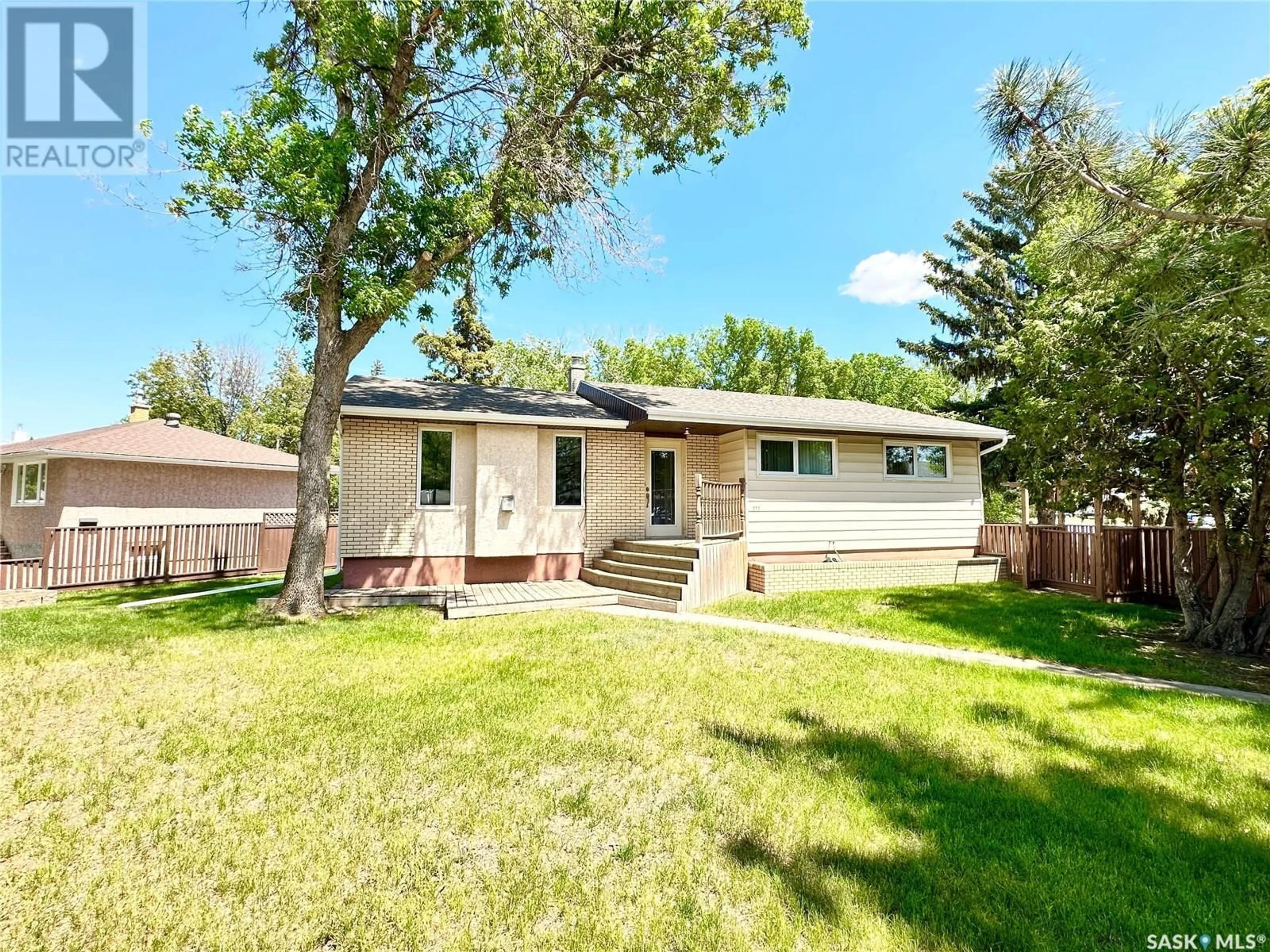 Frontside or backside of a home for 211 Ash DRIVE, Weyburn Saskatchewan S4H0S4