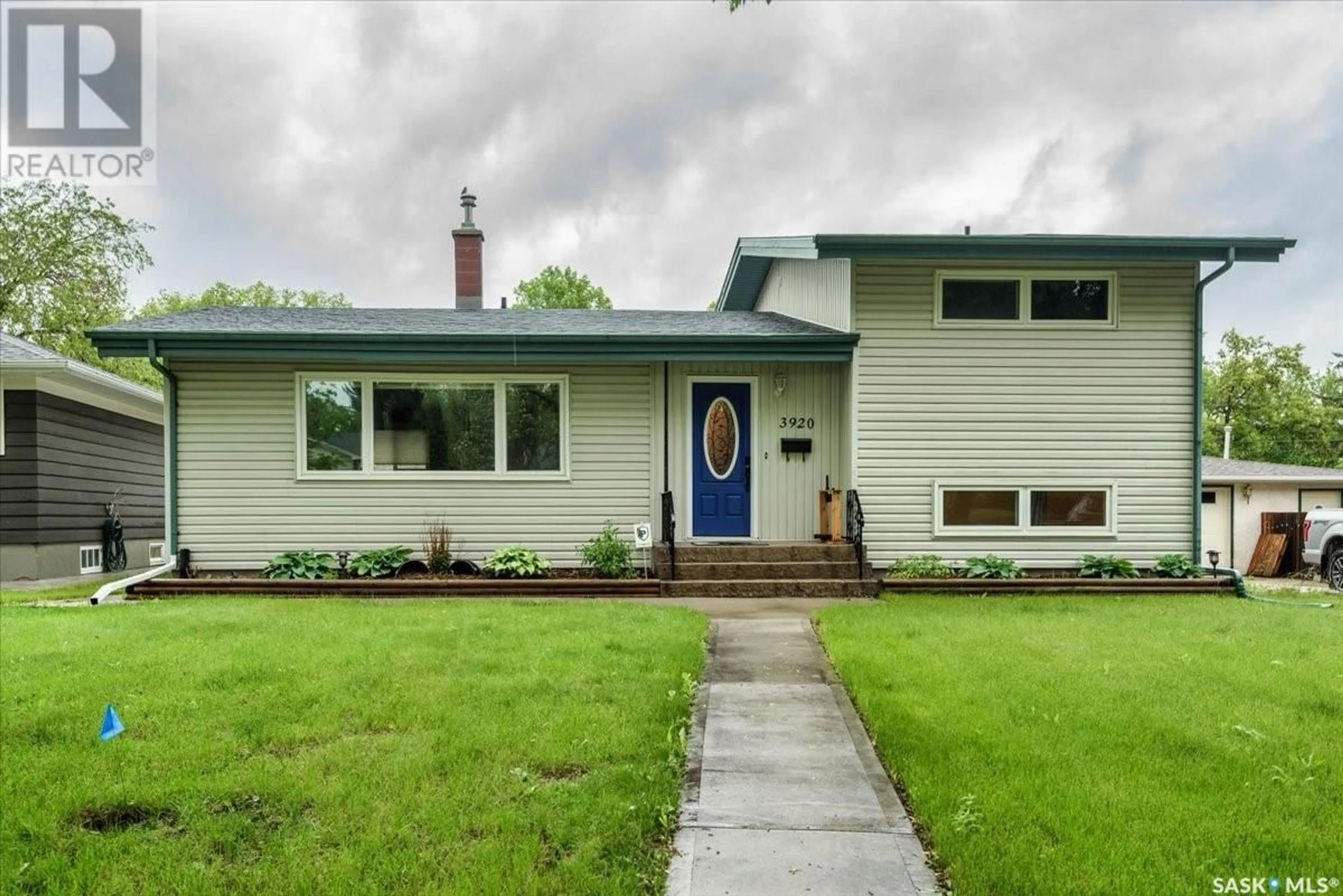 Home with vinyl exterior material for 3920 18th AVENUE, Regina Saskatchewan S4S0C2