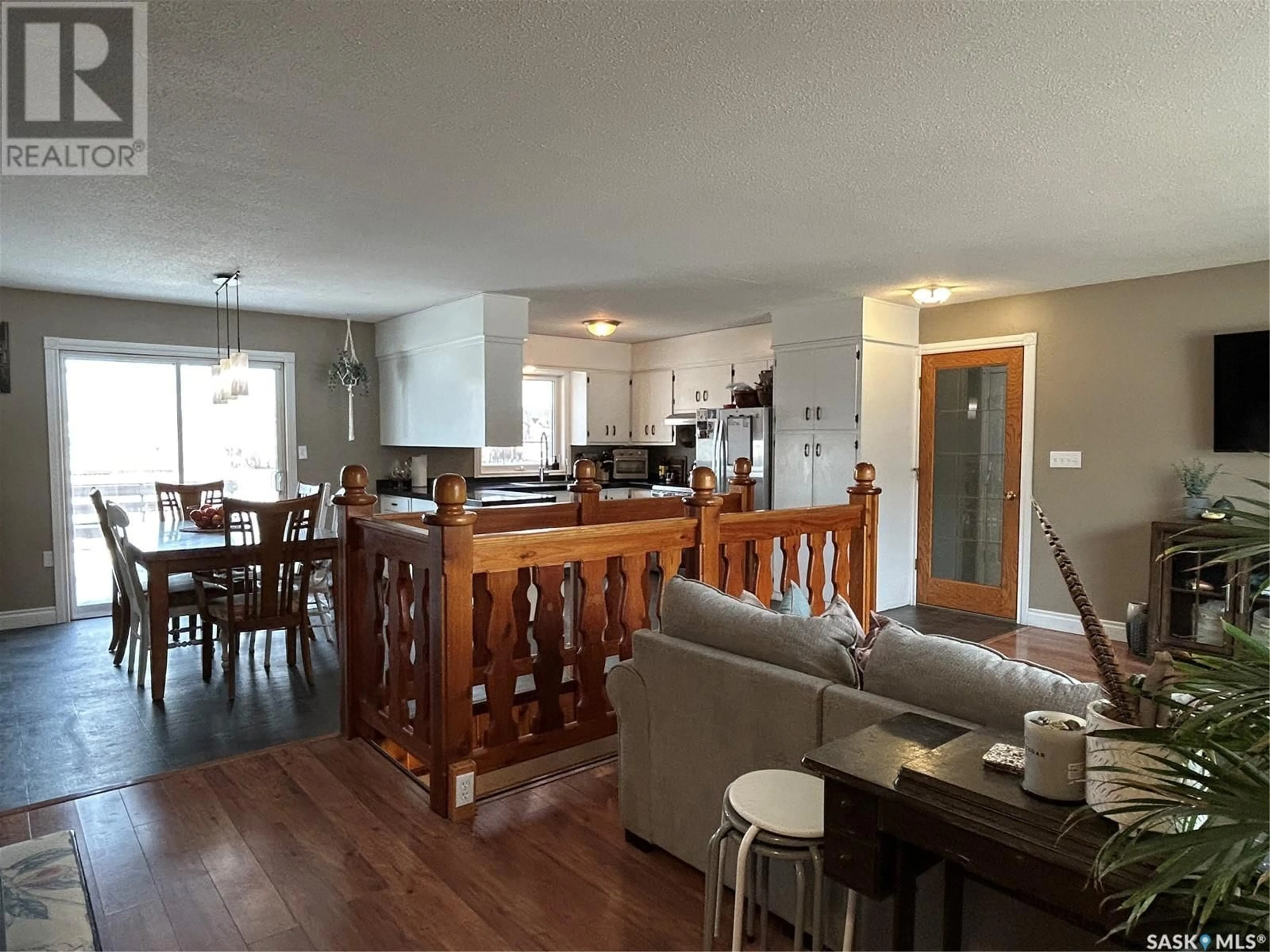 Open concept kitchen, wood/laminate floor for 848 BERYL AVENUE, Oxbow Saskatchewan S0C2B0