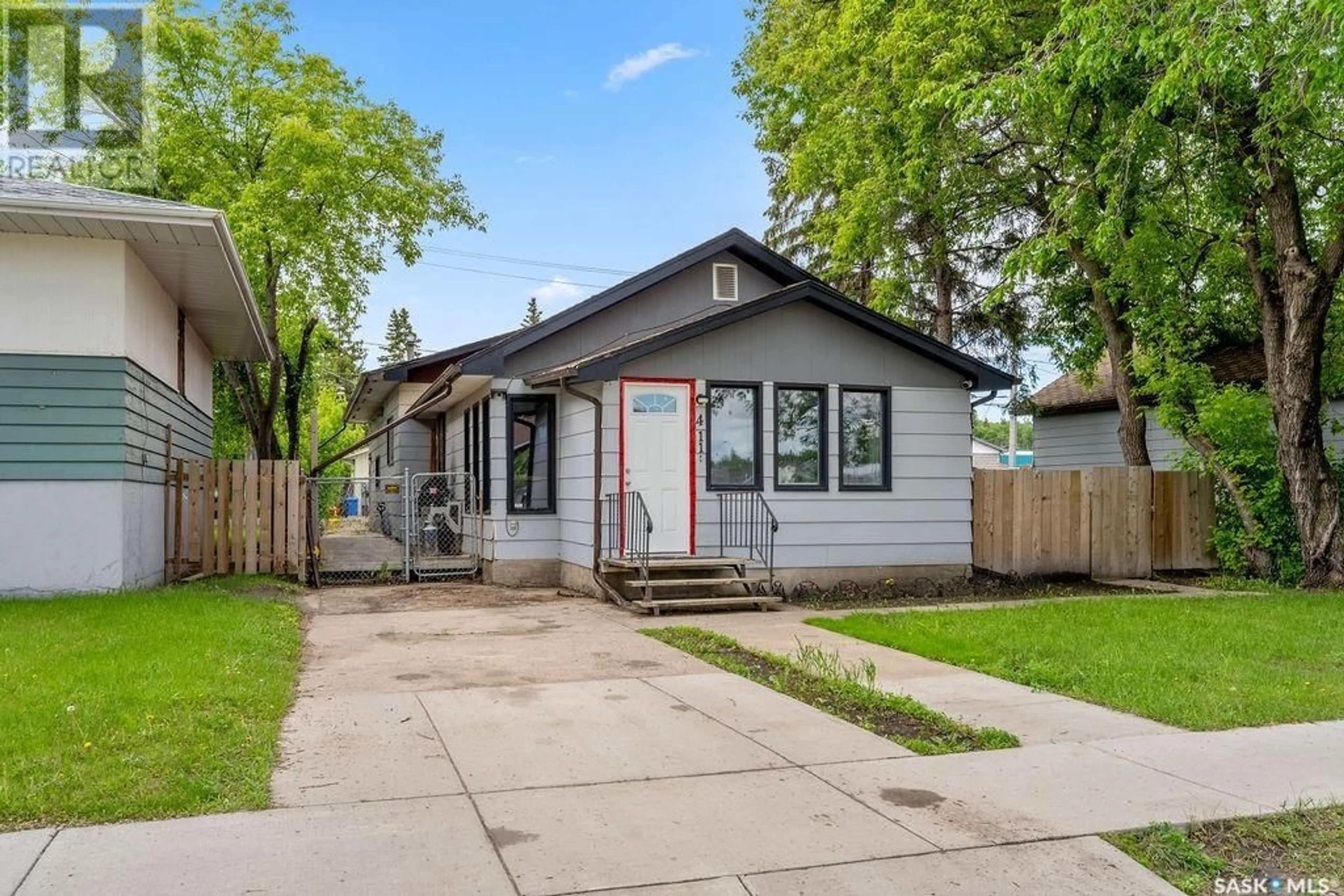 Frontside or backside of a home for 411 15th STREET W, Prince Albert Saskatchewan S6V3R3