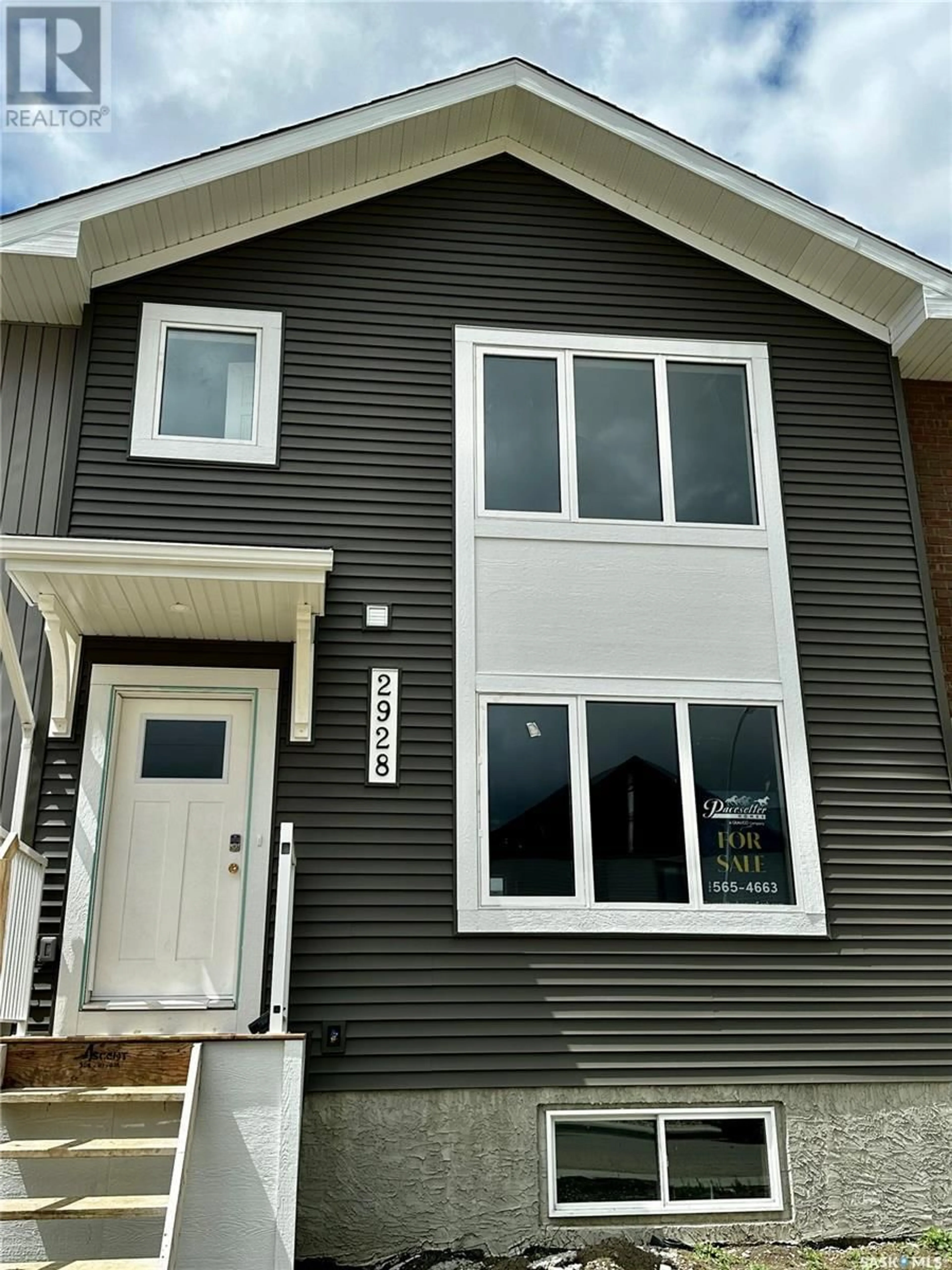 Home with vinyl exterior material for 2928 George STREET, Regina Saskatchewan S4V3W1
