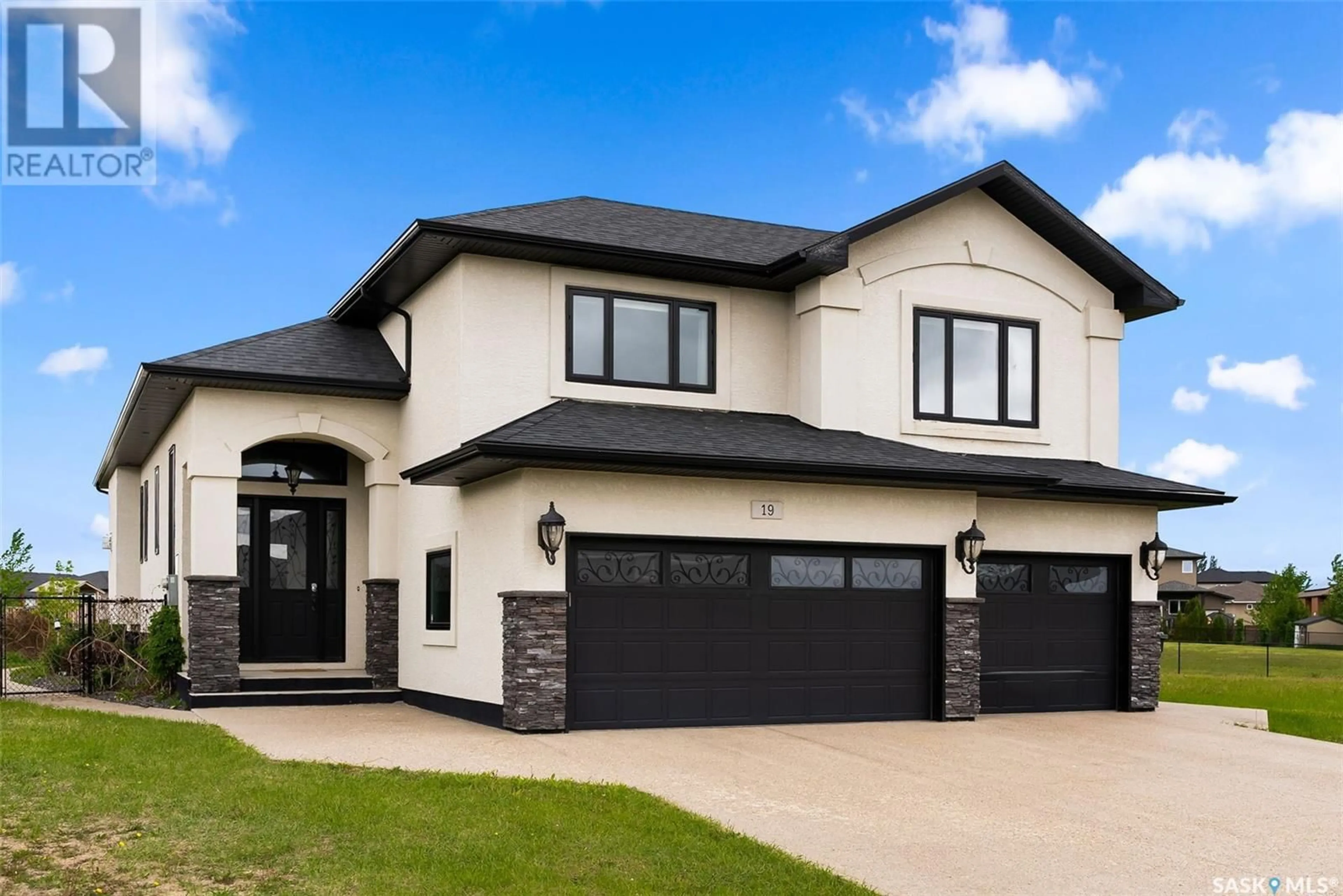 Frontside or backside of a home for 19 College CRESCENT, White City Saskatchewan S4L0C6