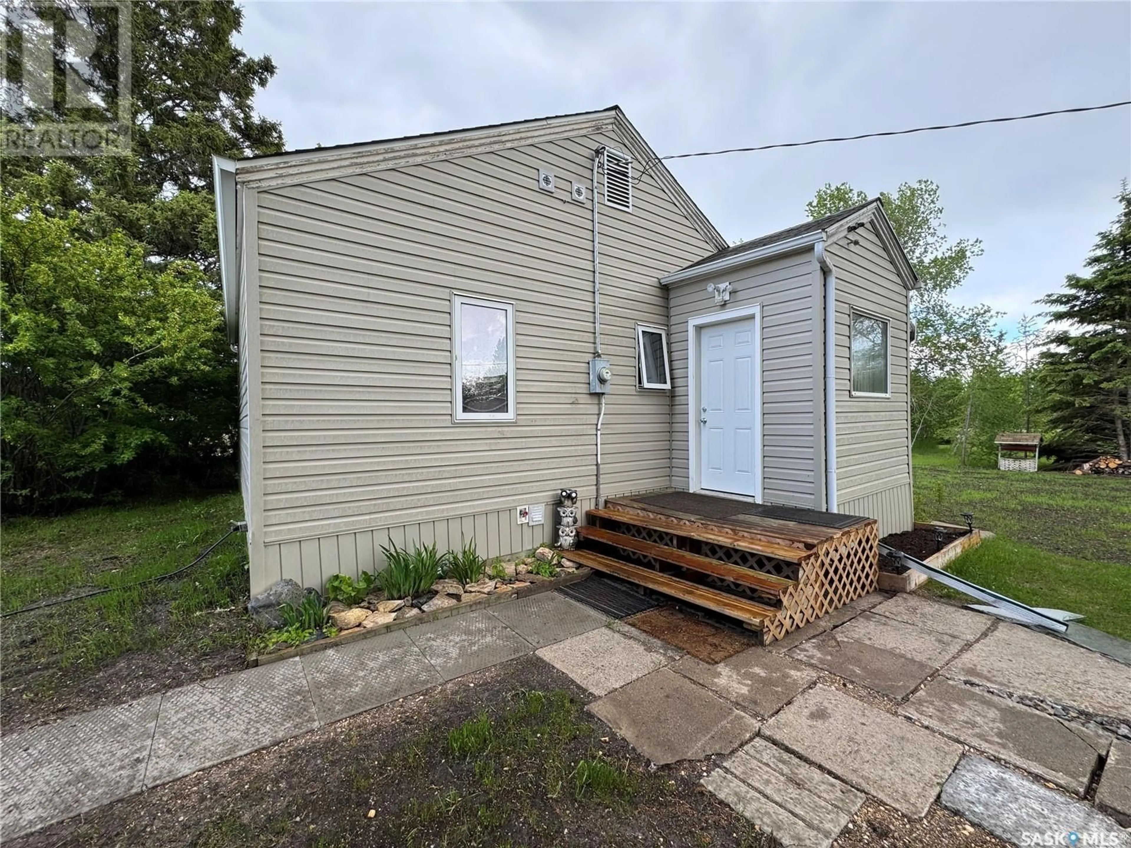 Frontside or backside of a home, cottage for 12 3rd STREET E, Hyas Saskatchewan S0A1K0