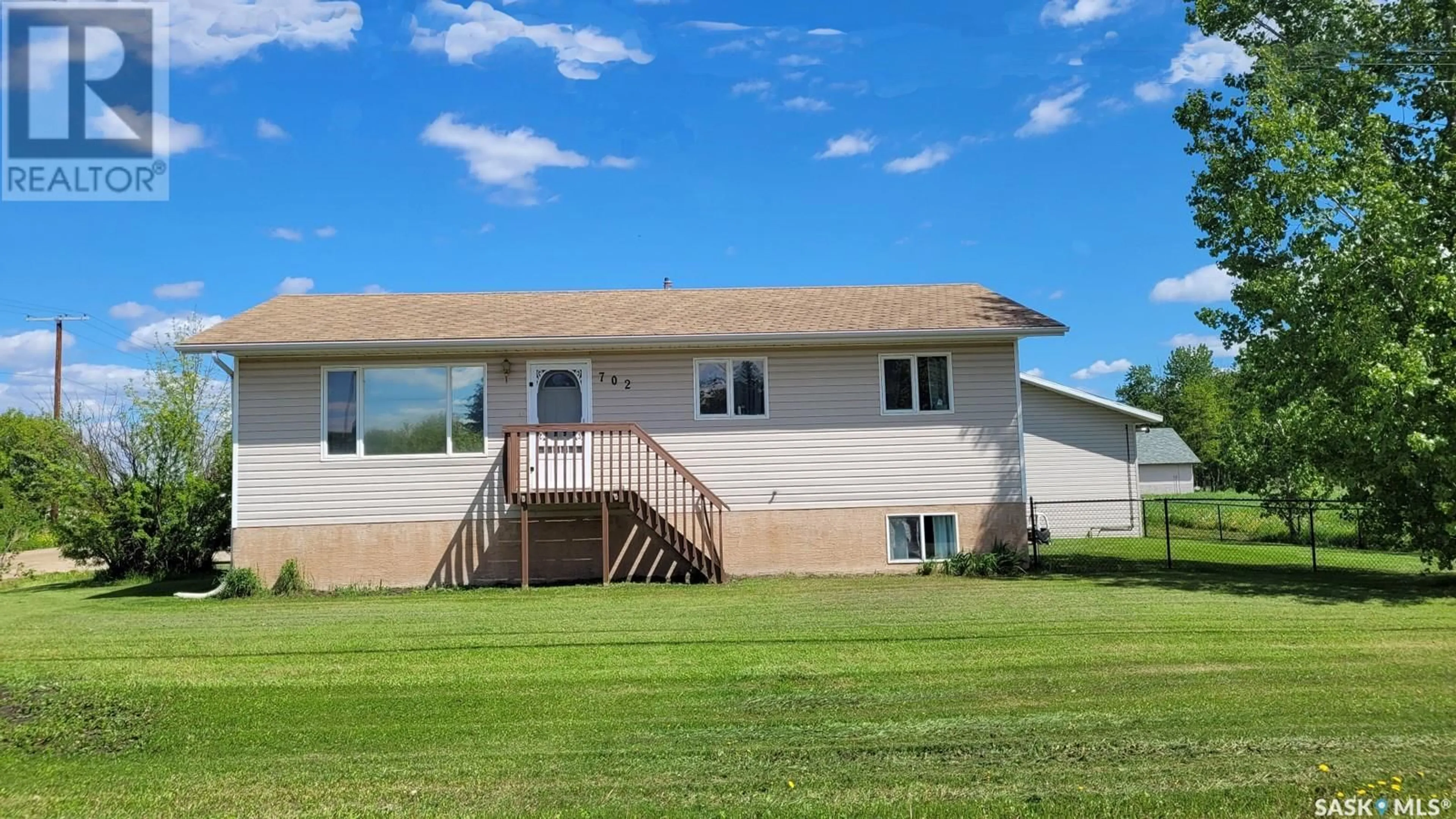 Frontside or backside of a home for 702 6th STREET E, Meadow Lake Saskatchewan S9X1J3