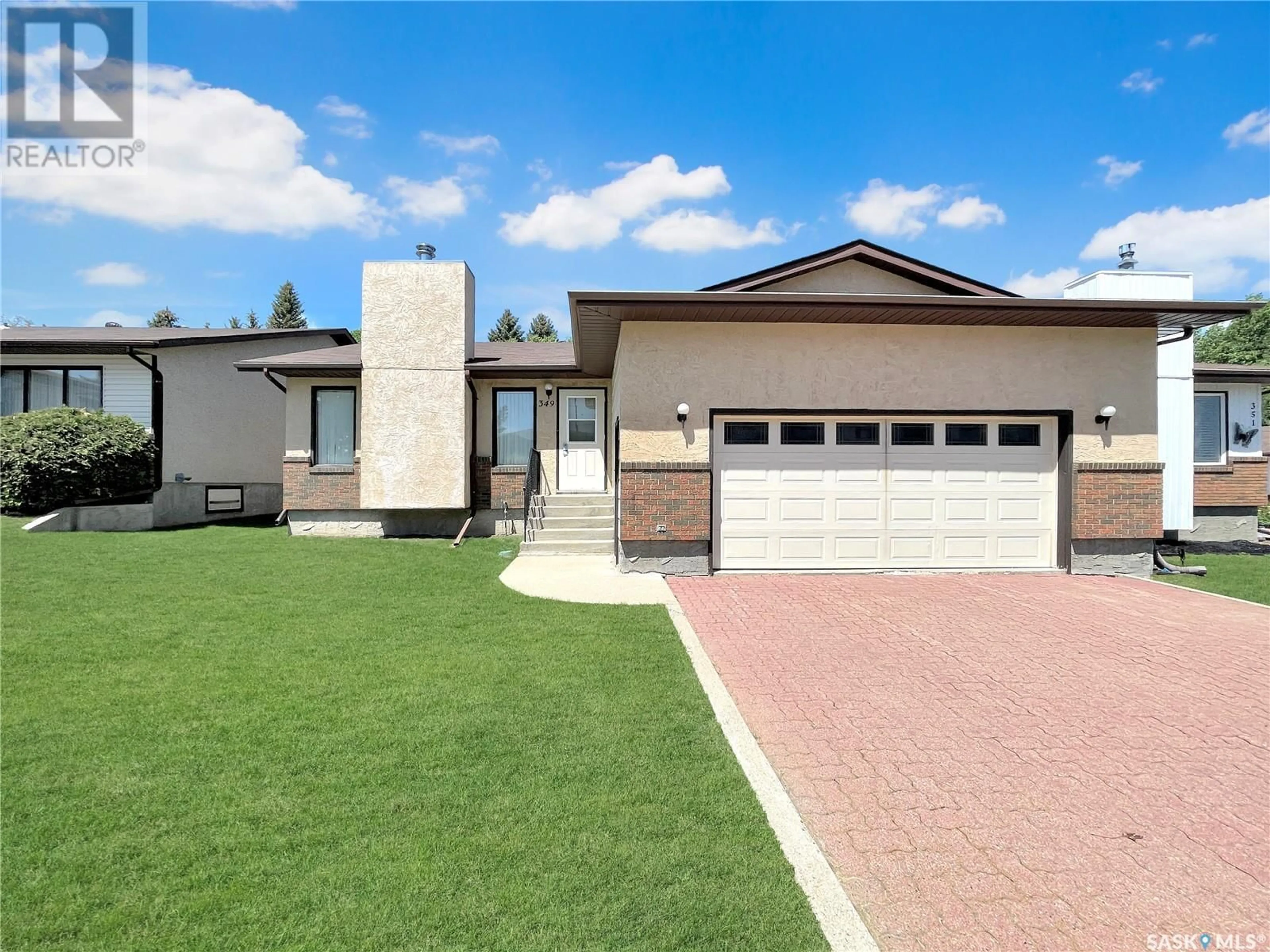 Home with brick exterior material for 349 Cypress DRIVE, Swift Current Saskatchewan S9H4V8