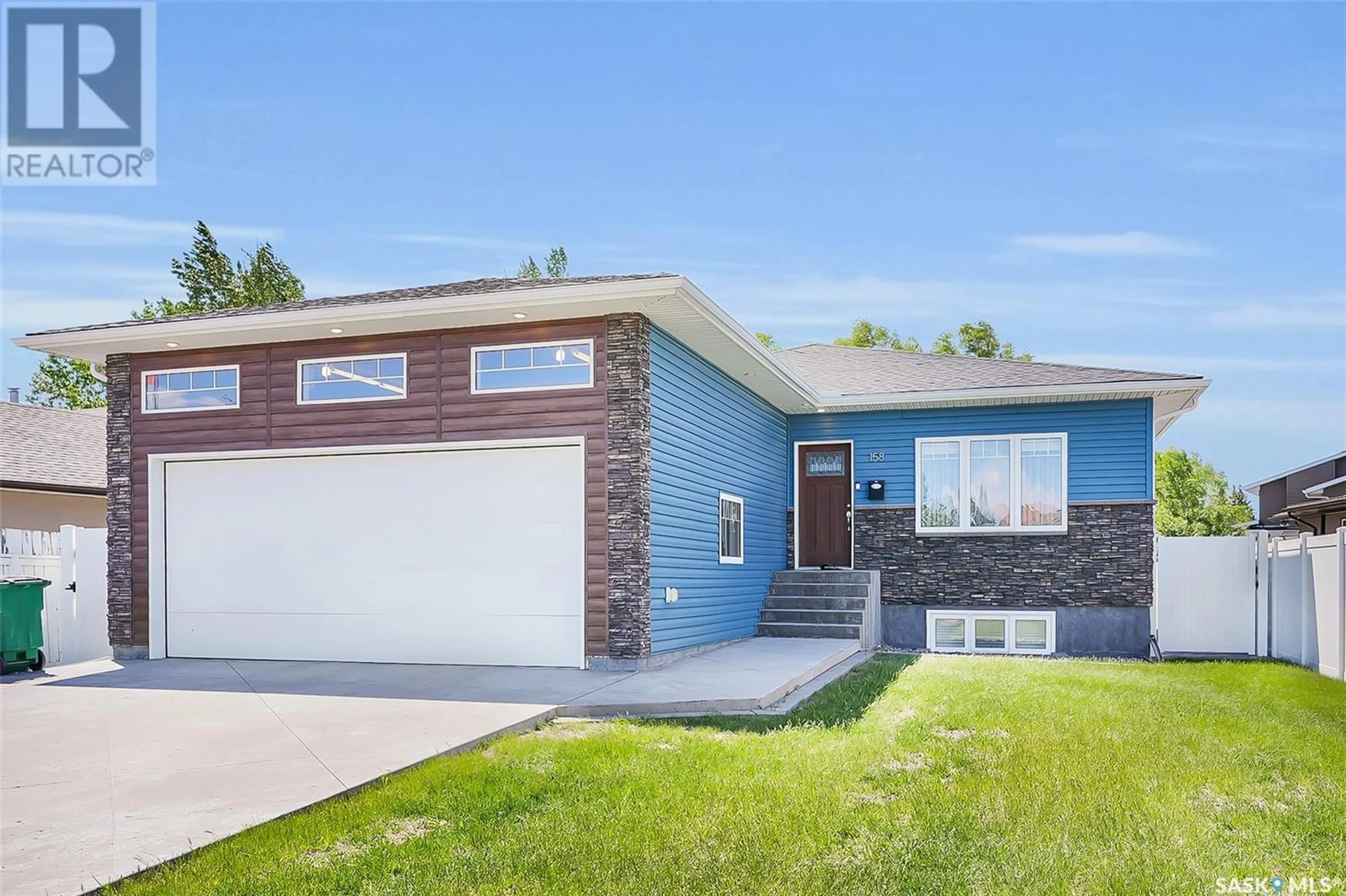 Frontside or backside of a home for 158 Wood Lily DRIVE, Moose Jaw Saskatchewan S6J1H5