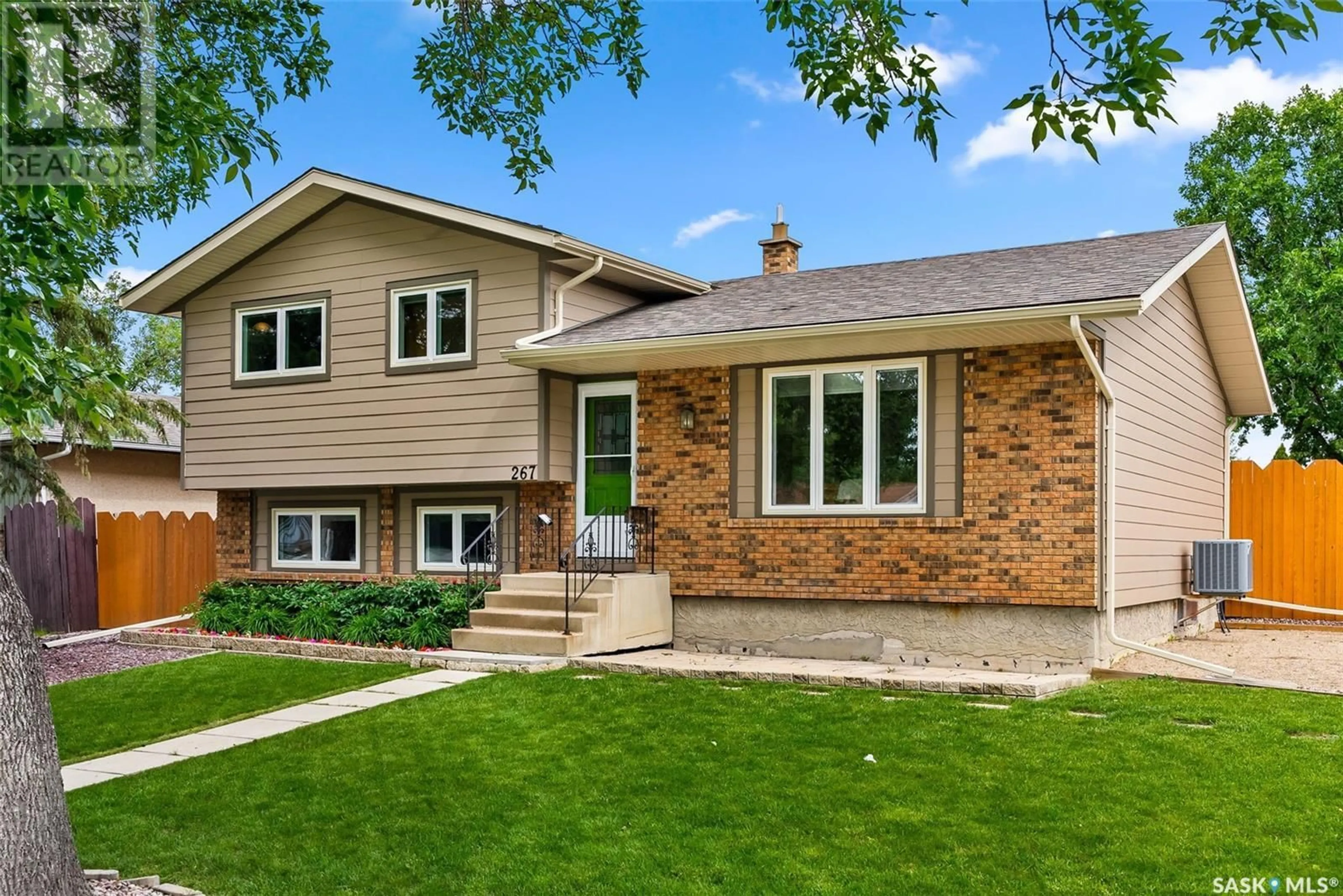 Home with brick exterior material for 267 Dalgliesh DRIVE, Regina Saskatchewan S4R8A2